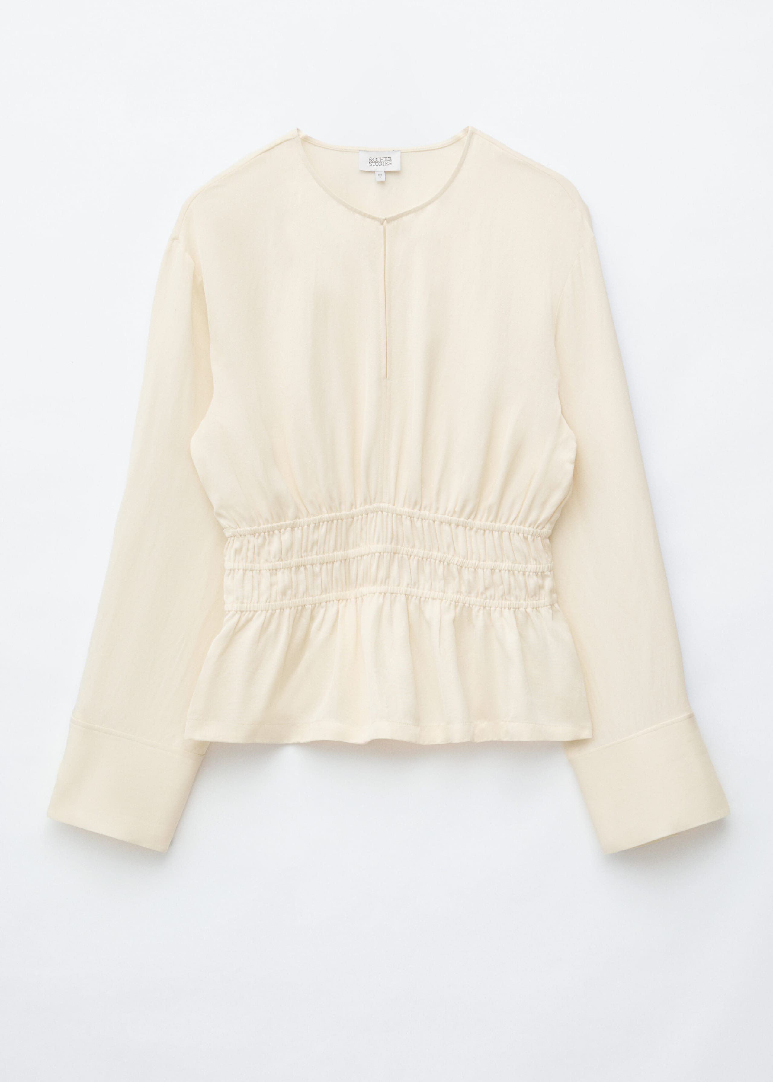 Leinenbluse mit gesmokter Taille - Cremeweiß - Stillleben