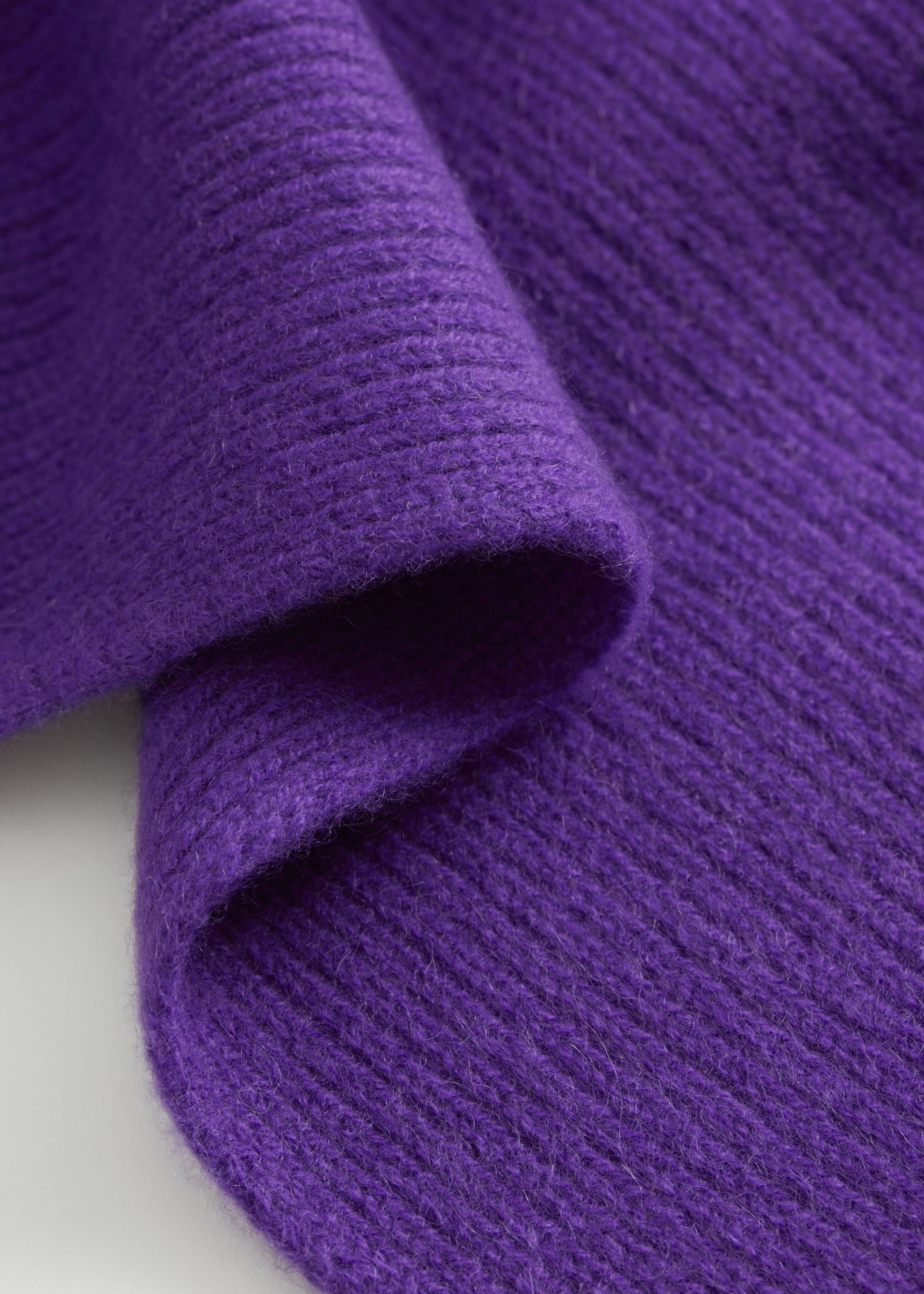 Bufanda de punto de cachemira - {{variantName}} - Detalle descriptivo