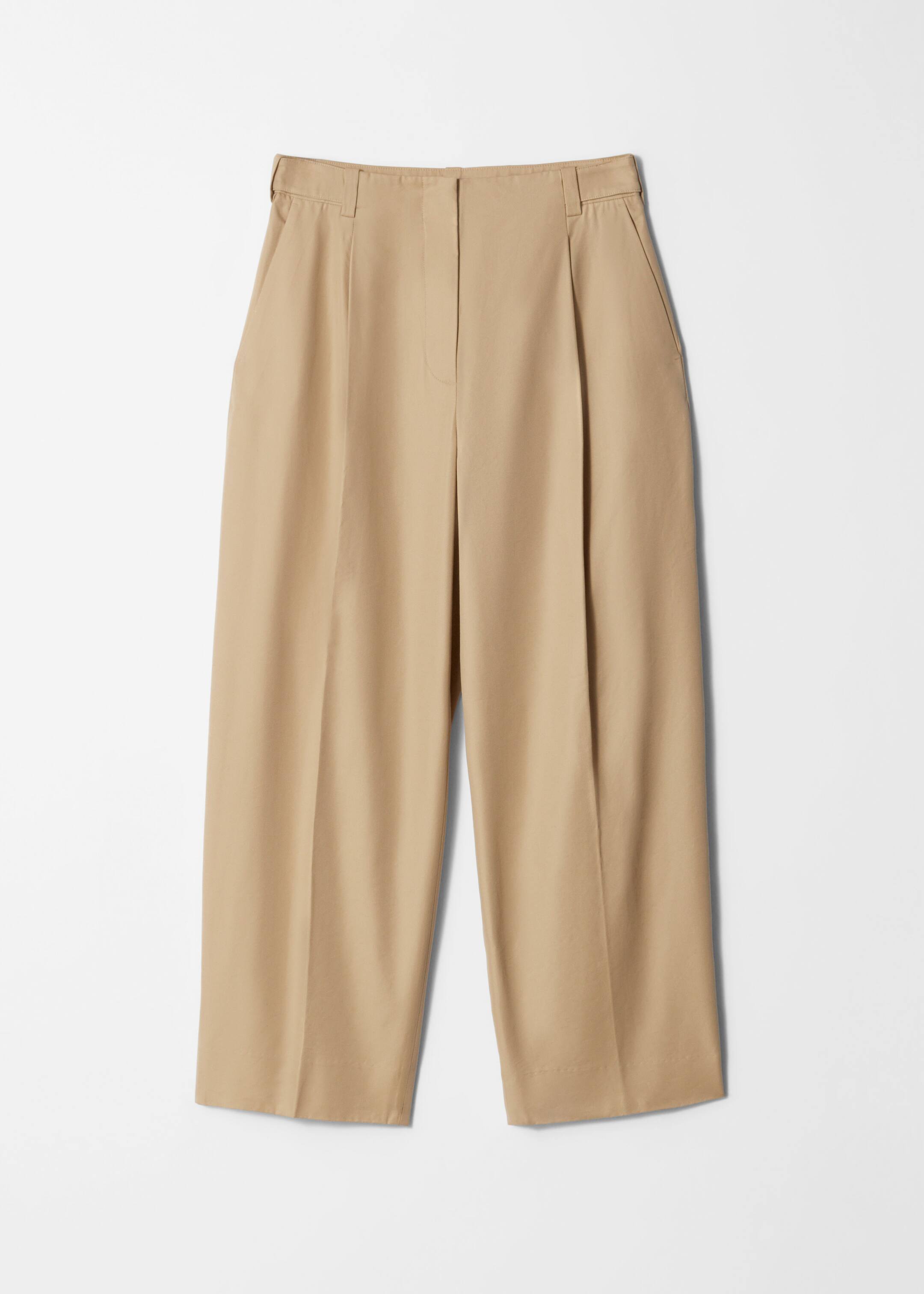 Visa större bild: Avsmalnande byxa med pressveck - Beige - DAM | H&M SE 7