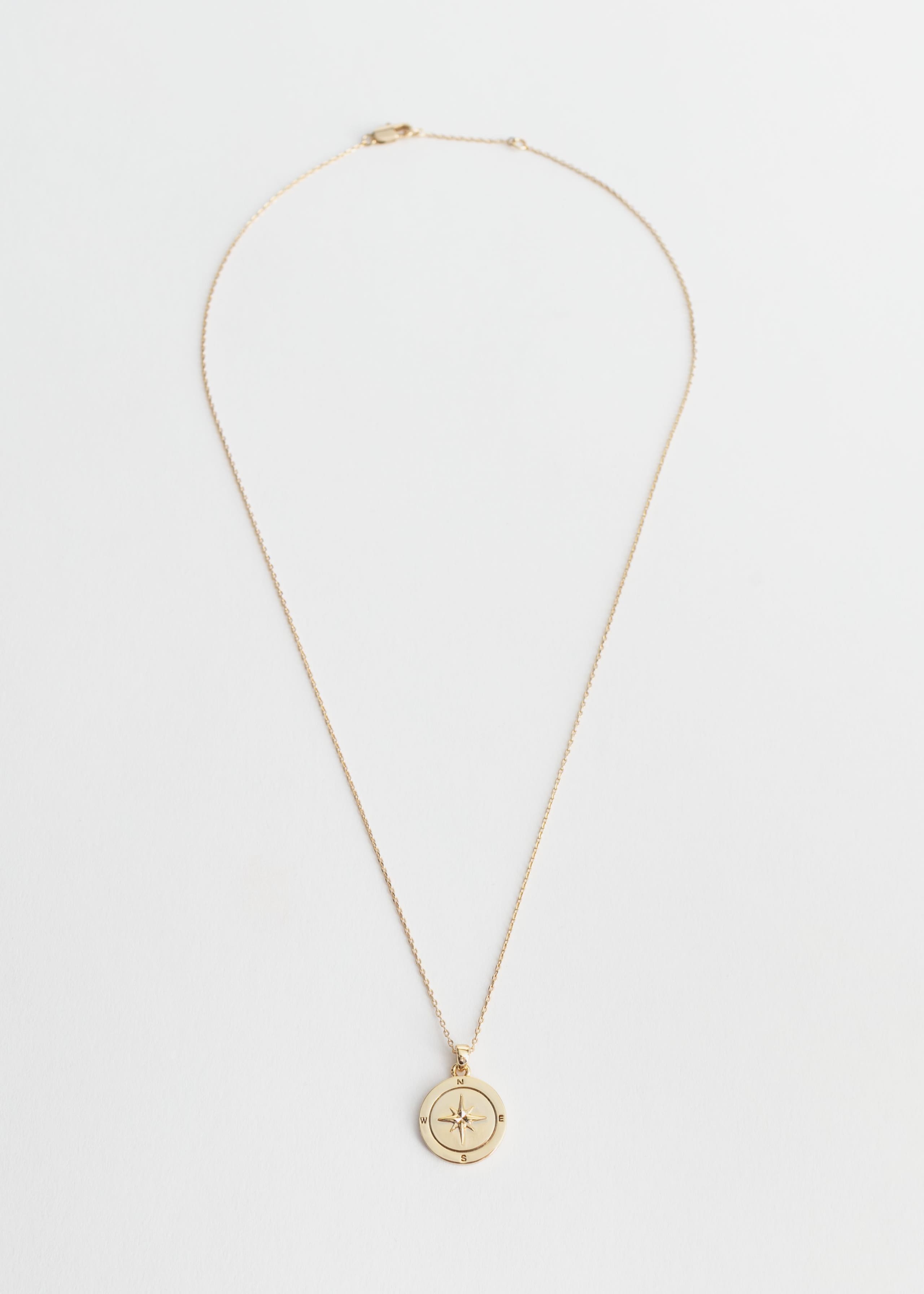 Compass Pendant Necklace - Gold - Natura morta