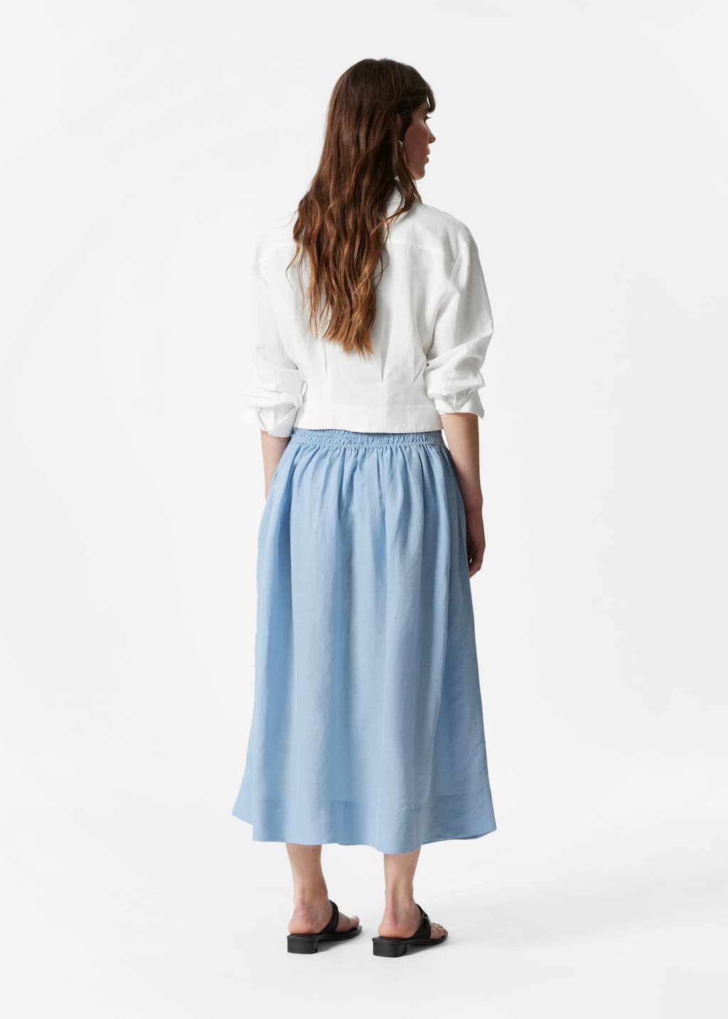 Image of Falda midi con cintura fruncida con nido de abeja