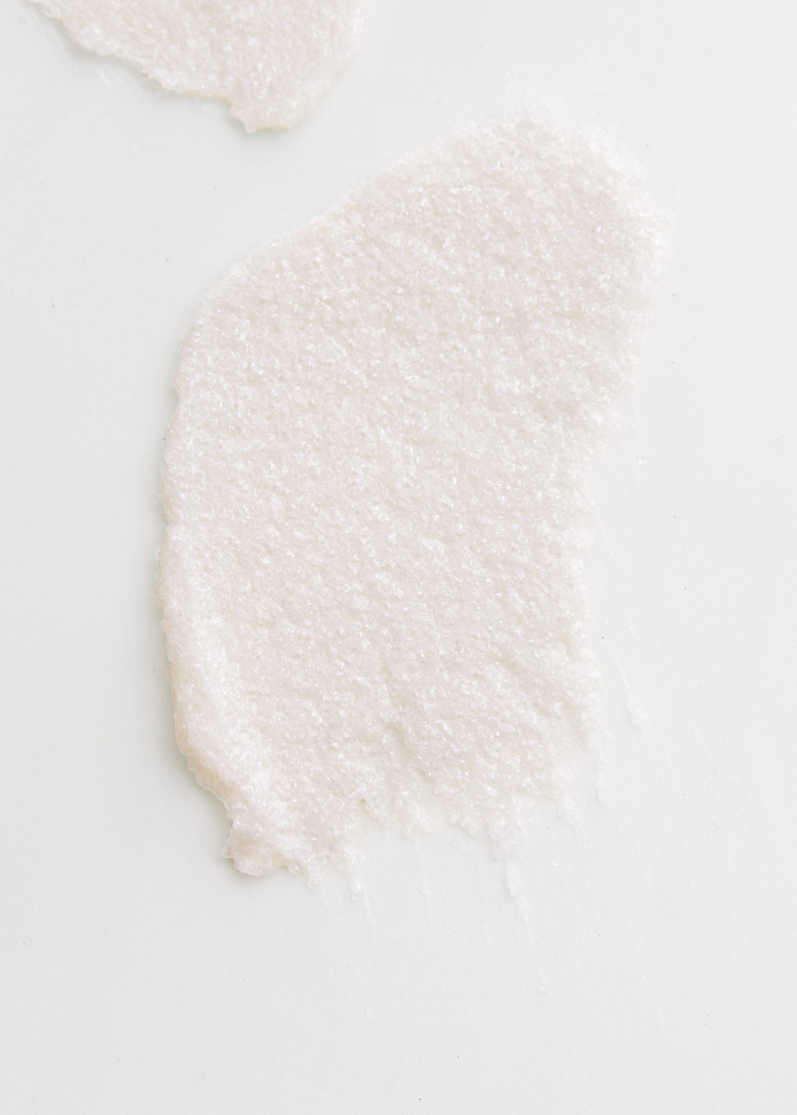 Exfoliante corporal con efecto brillante - {{variantName}} - Detalle descriptivo