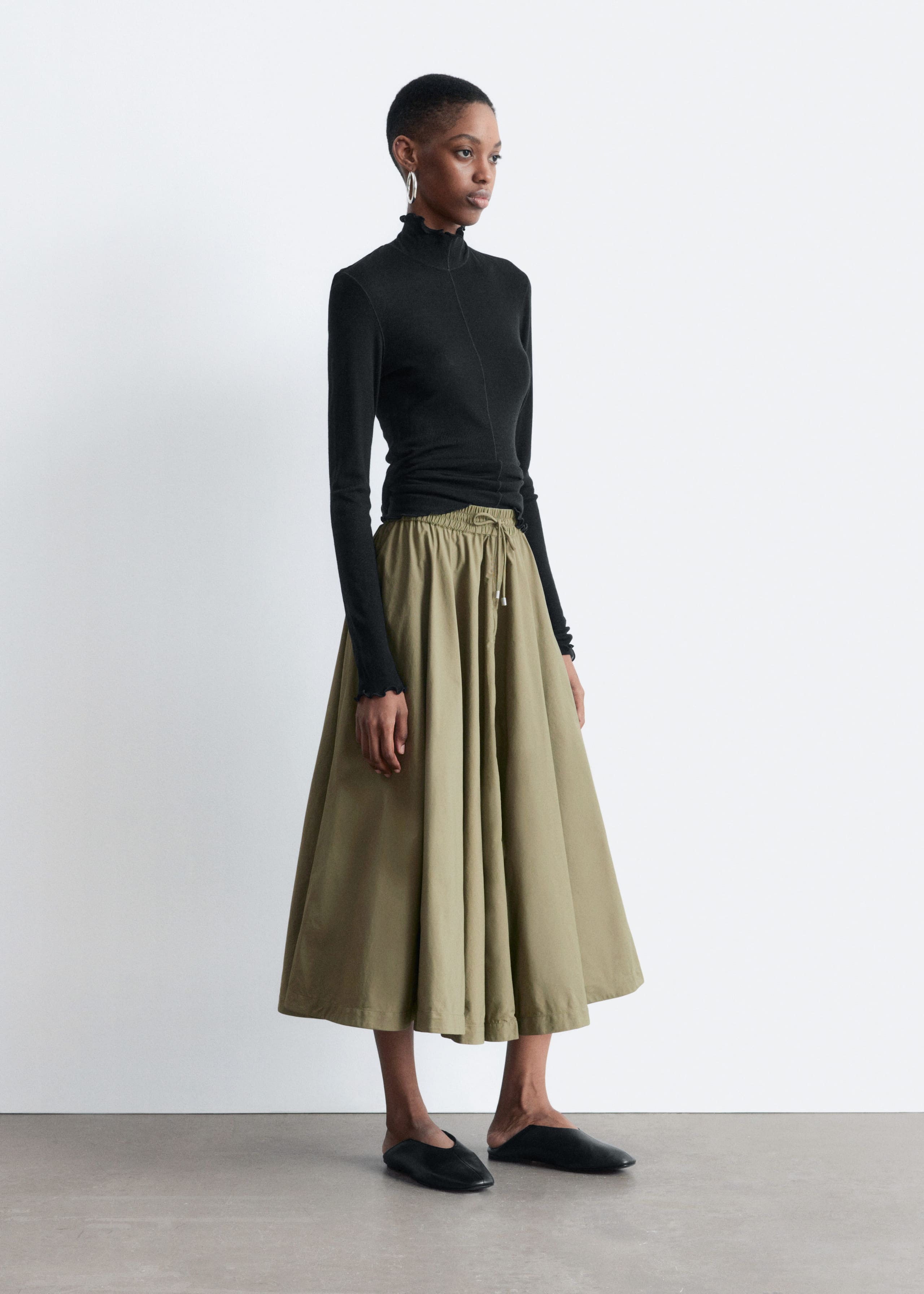 Image of Scalloped Mock-Neck Top