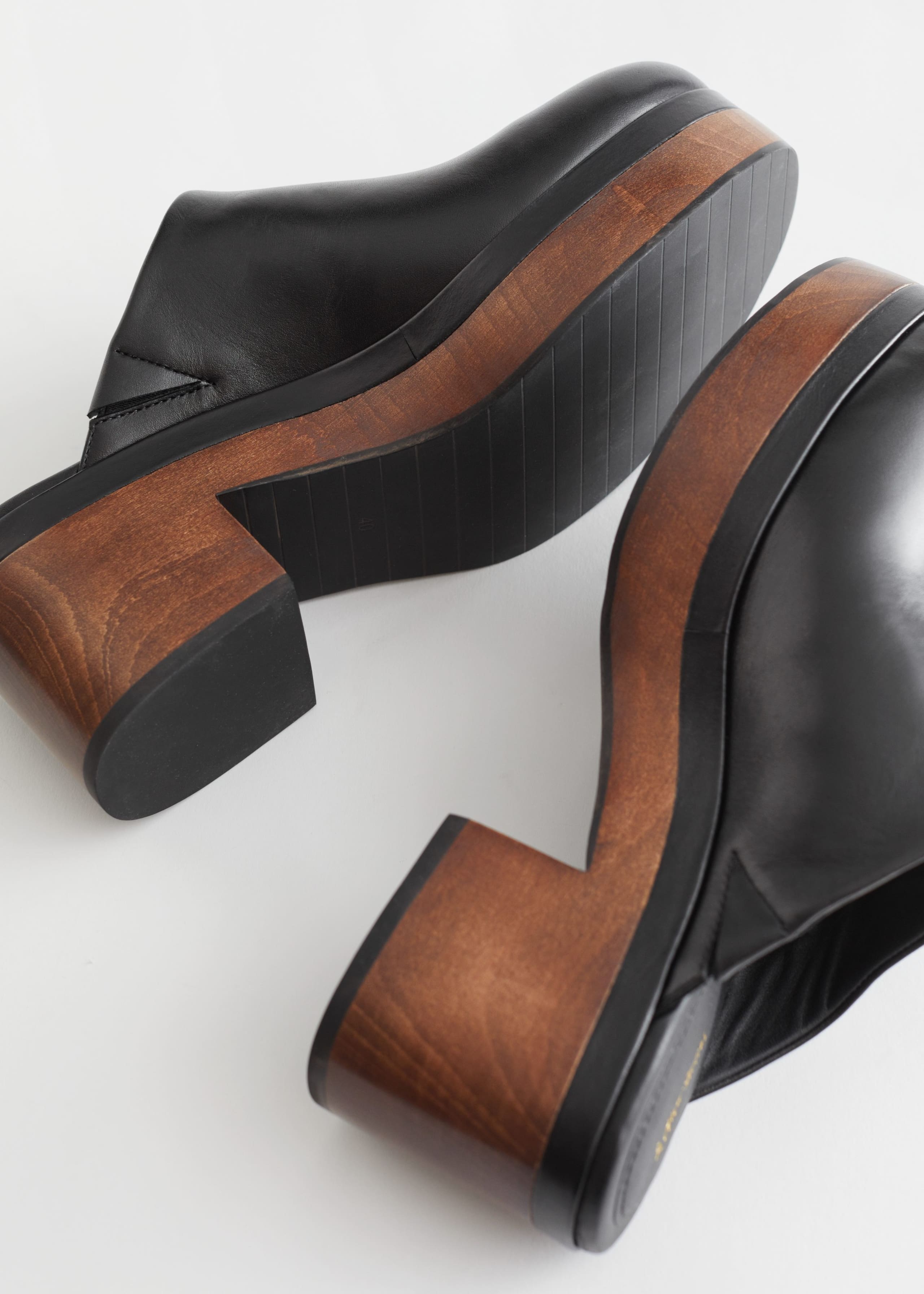 Wooden Heel Clogs - {{variantName}} - Descriptive Detail