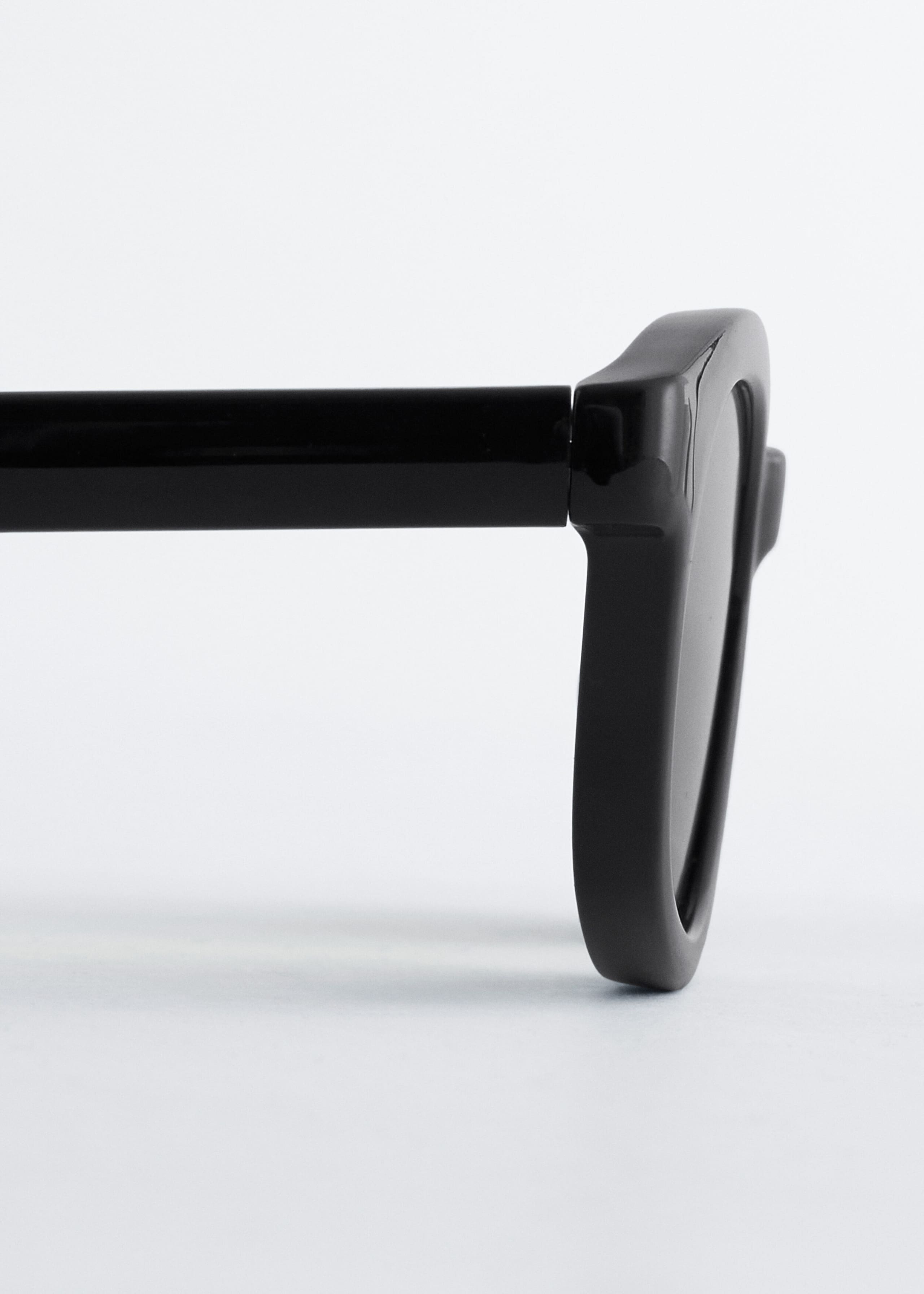 Narrow Rectangle Sunglasses - {{variantName}} - Descriptive Detail