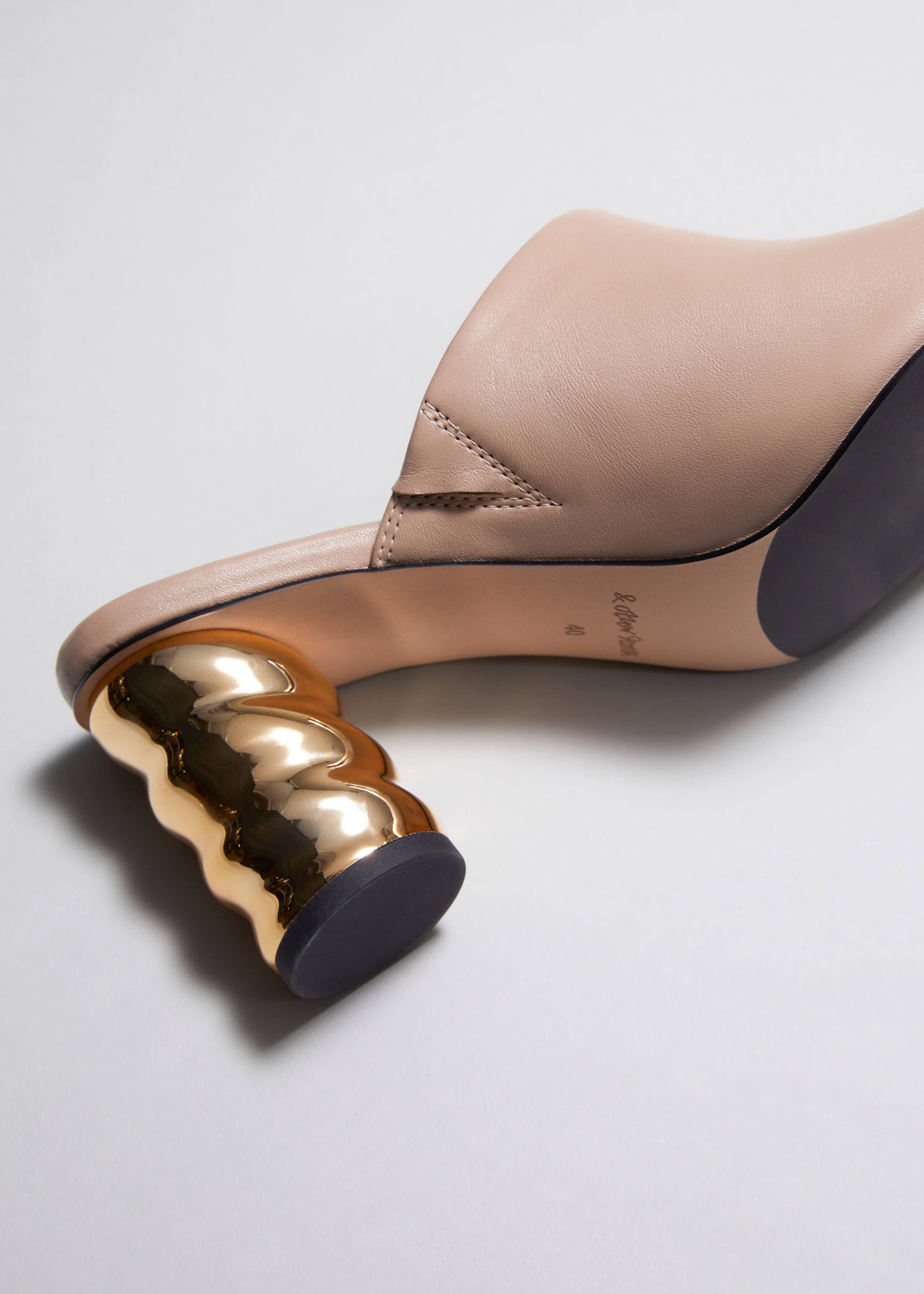 Sculptural Heel Leather Mules - {{variantName}} - Descriptive Detail
