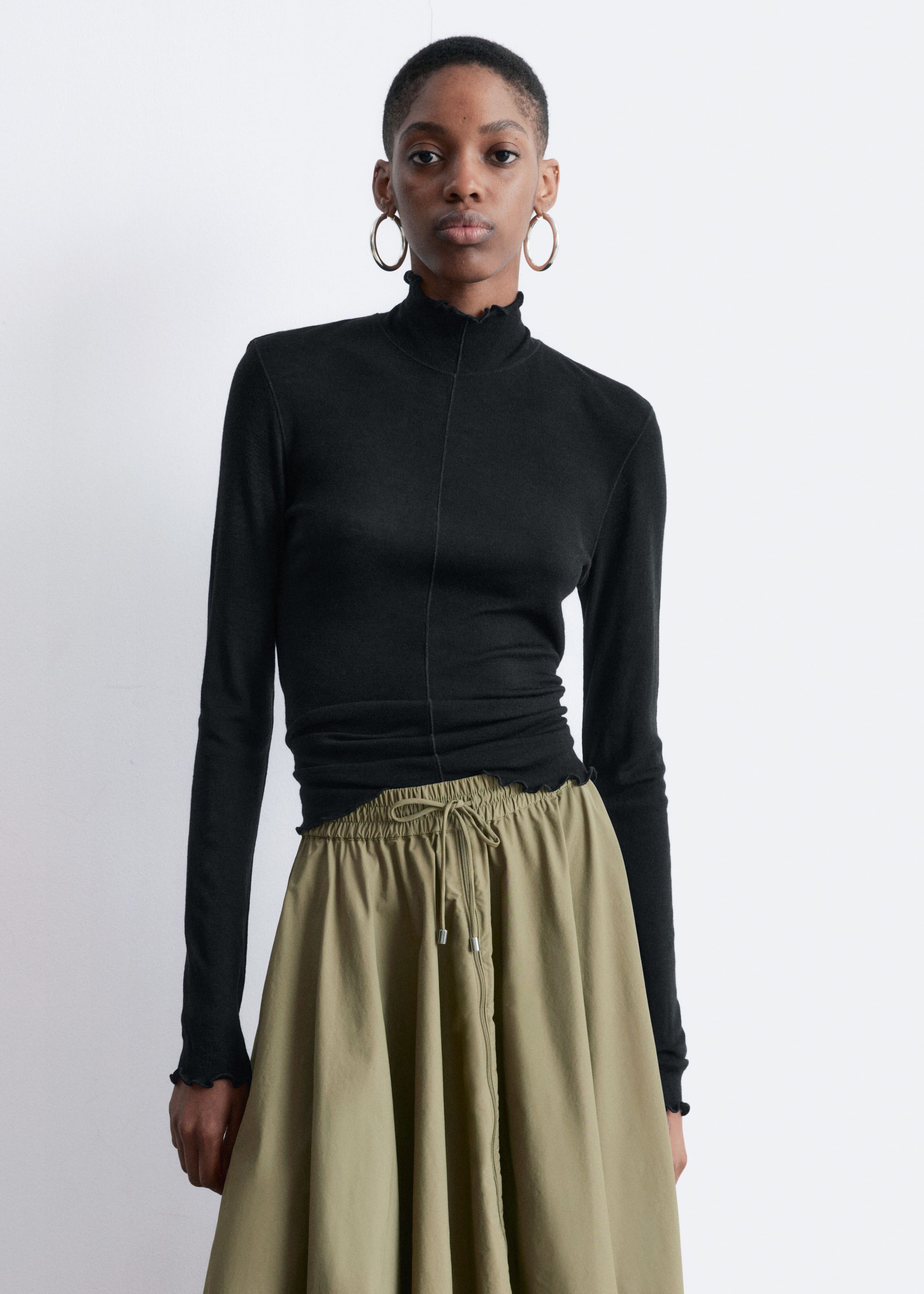 Image of Scalloped Mock-Neck Top