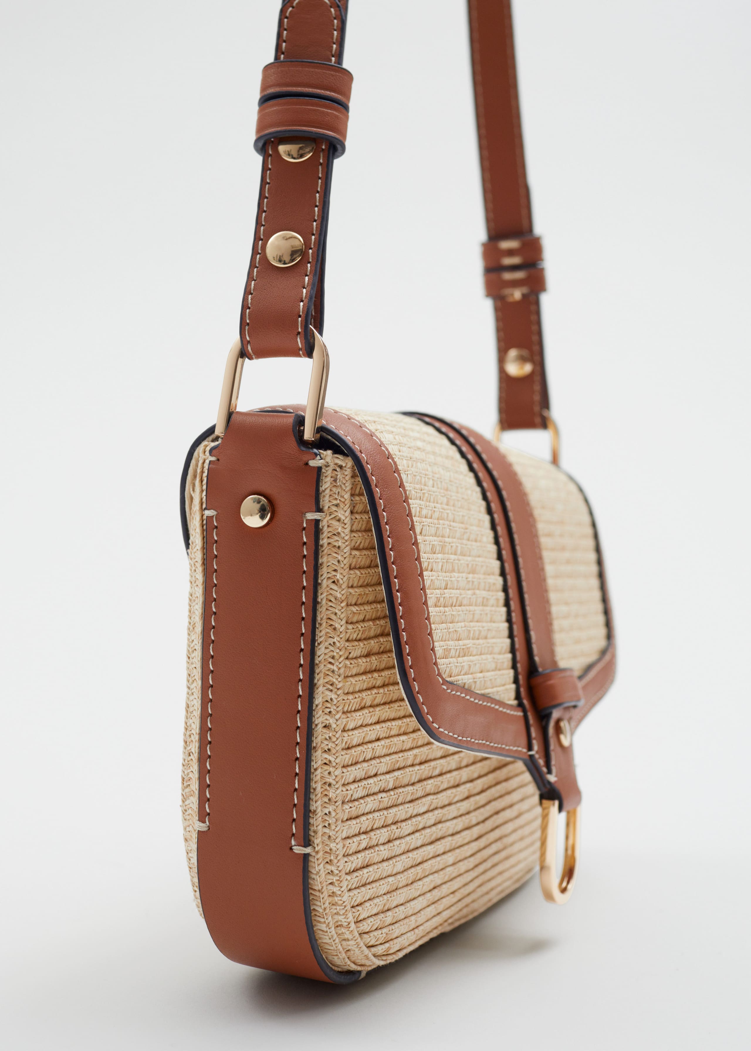 Strohtasche mit Lederbesatz - {{variantName}} - Beschreibendes Detail