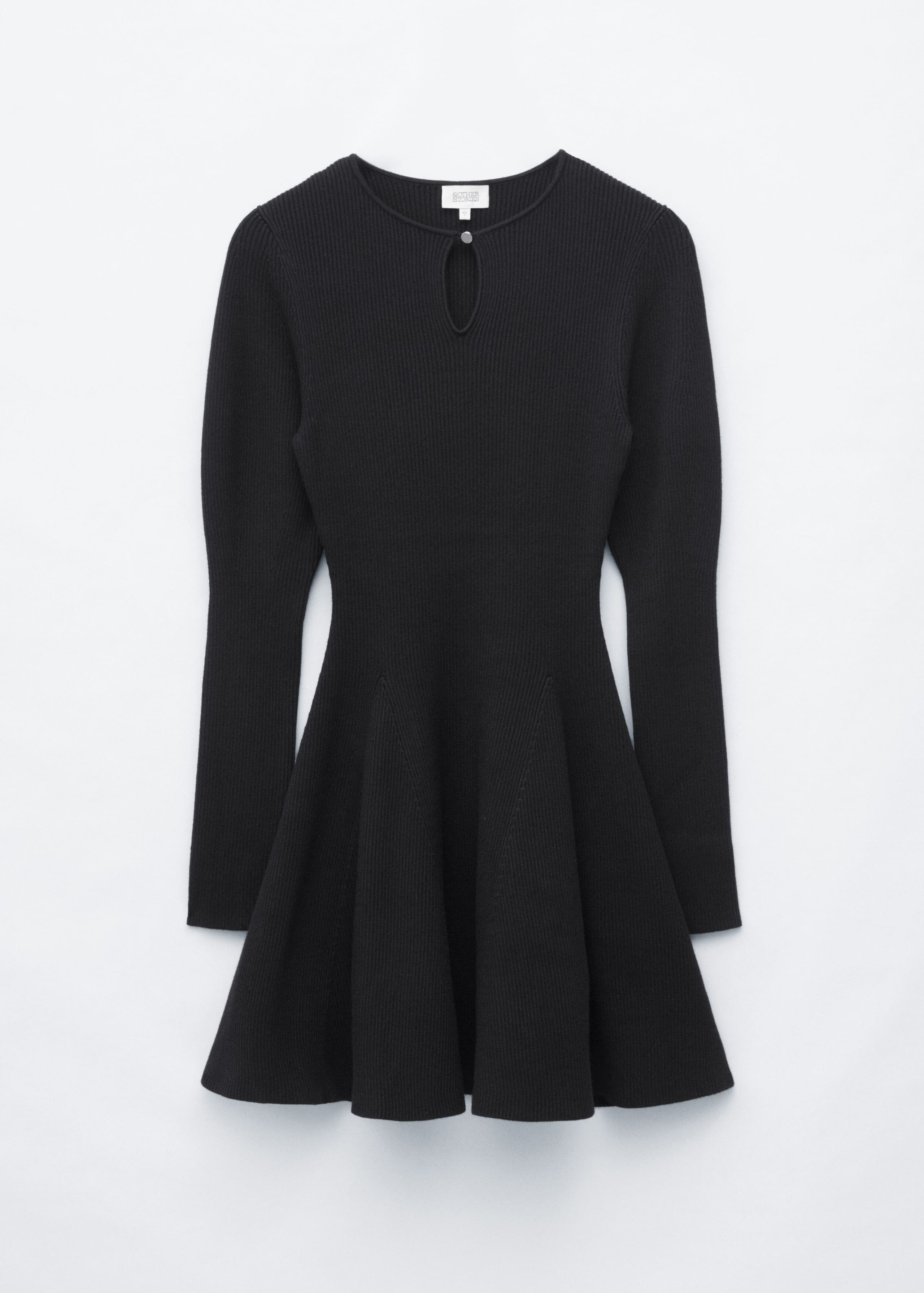 A black ribbed-knit mini dress is shown from the front, featuring a round neckline with a small keyhole cutout and a single-button closure. The dress has long sleeves, a fitted bodice, and a flared, structured A-line skirt.