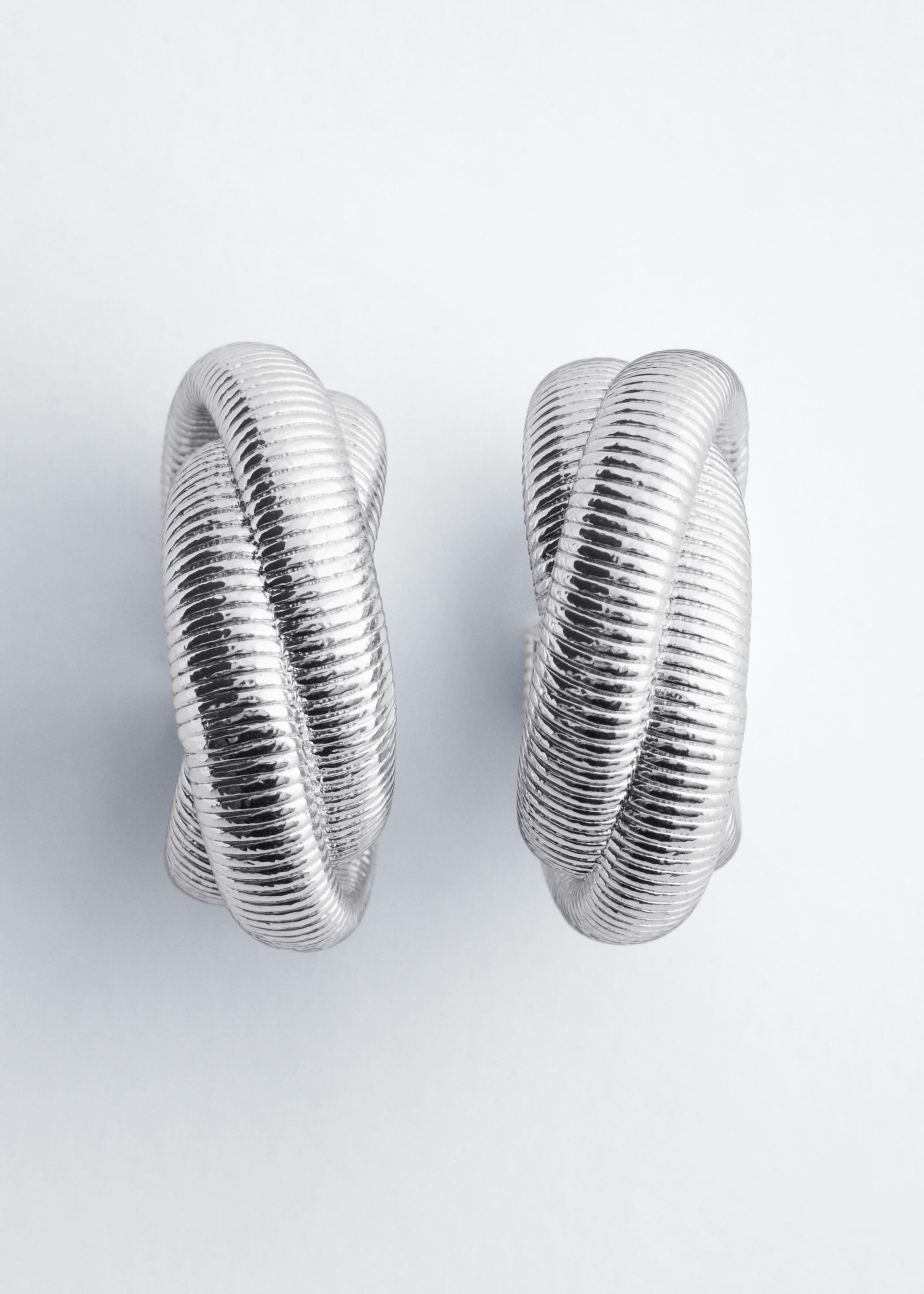 Plated Brass Twisted Hoops - {{variantName}} - Descriptive Detail