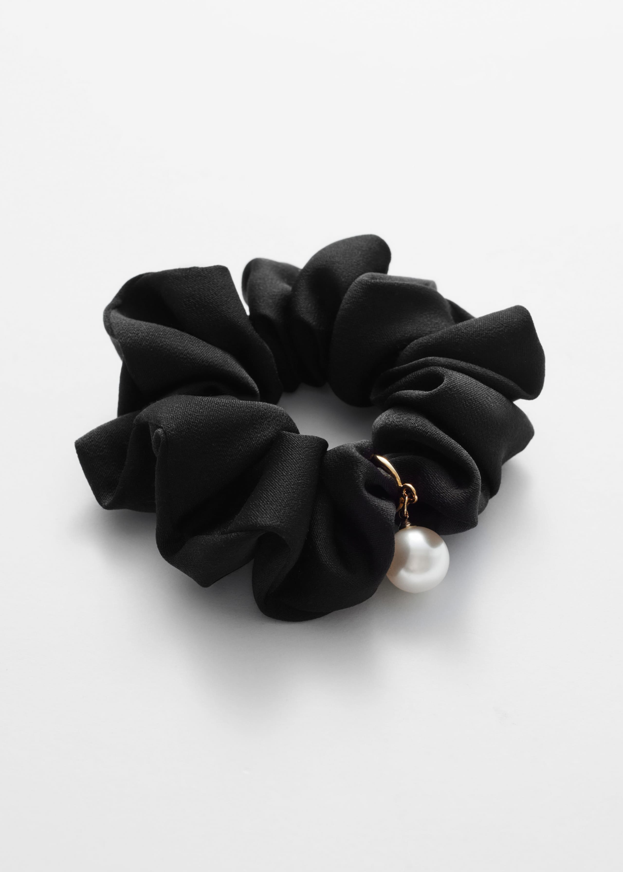 Coletero adornado con perla - Negro - Bodegón