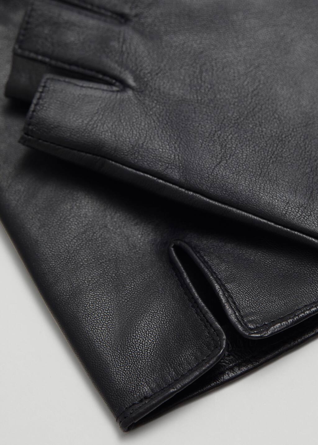 Guantes sin dedos de piel - {{variantName}} - Detalle descriptivo
