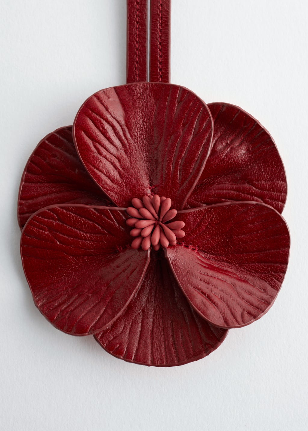 Image of Väsksmycke med blomma