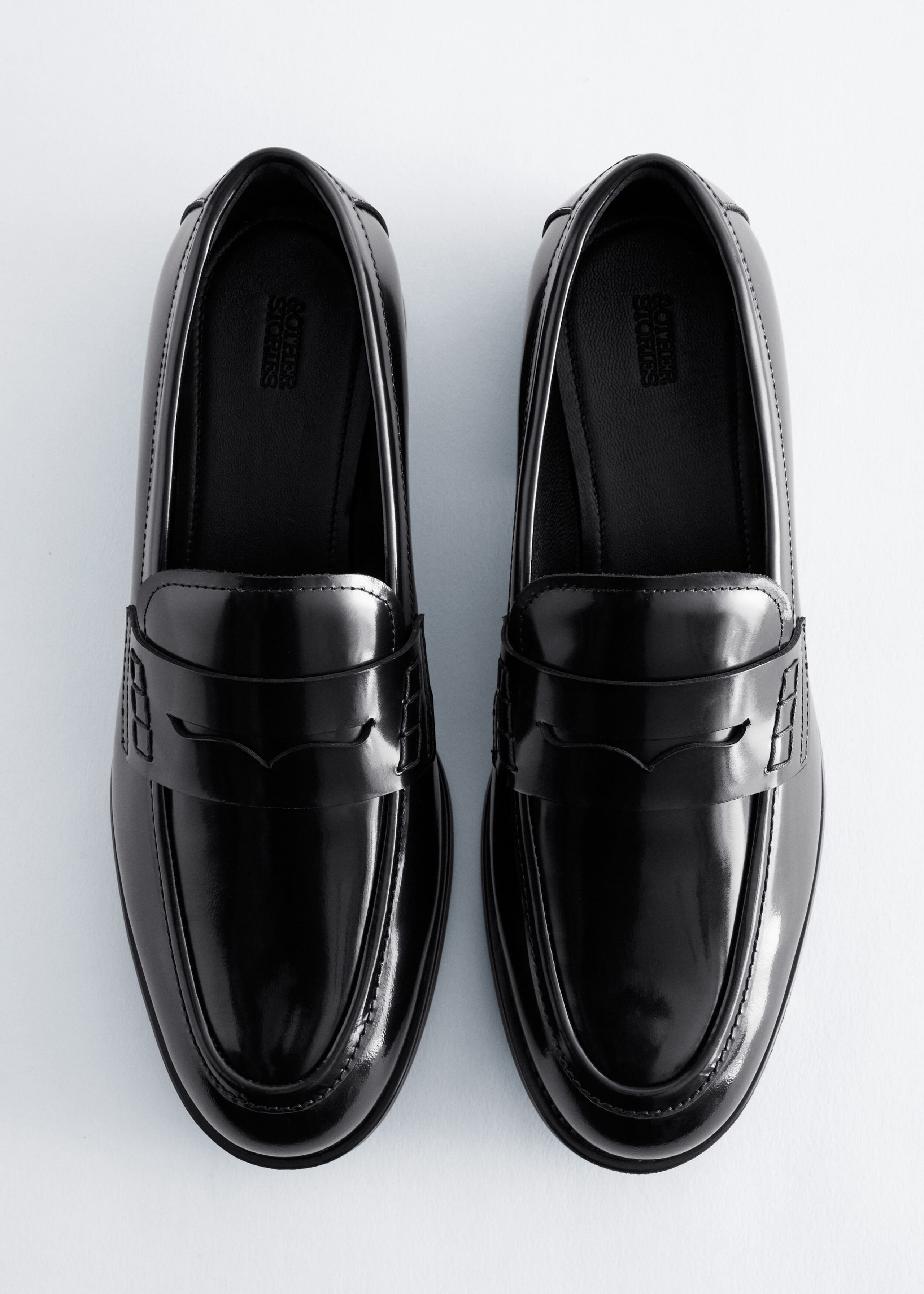 Penny-Loafer aus Leder - {{variantName}} - Beschreibendes Detail