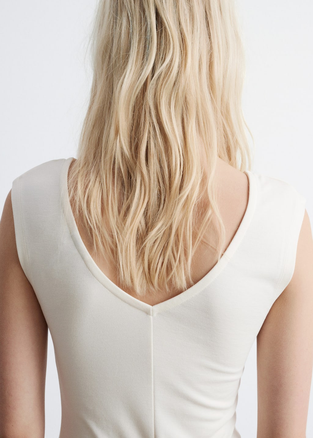 Image of Topp med v-ringad rygg