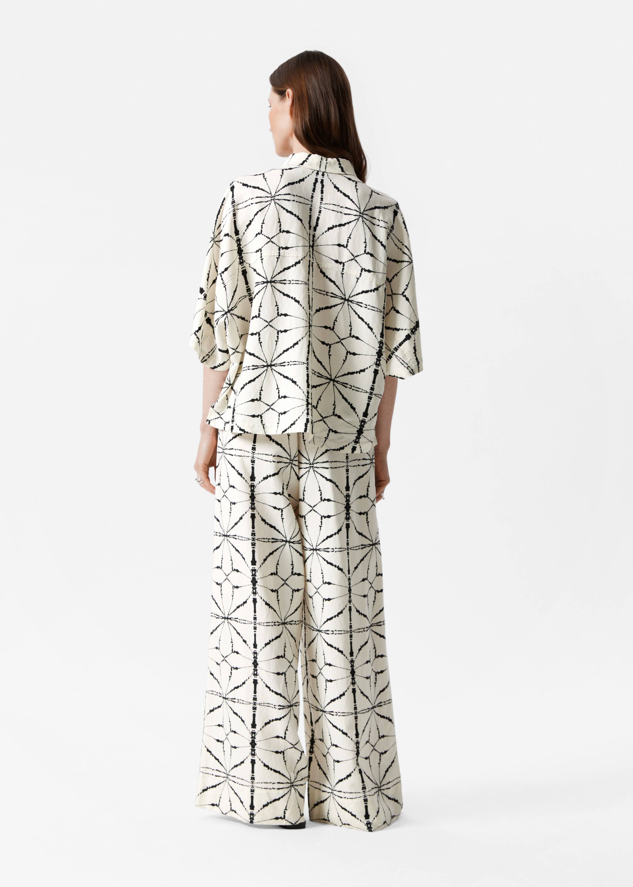 Visualizza immagine più grande: Pantaloni dalla vestibilità rilassata con coulisse - Bianco/Motivo nero - DONNA | H&M IT 3