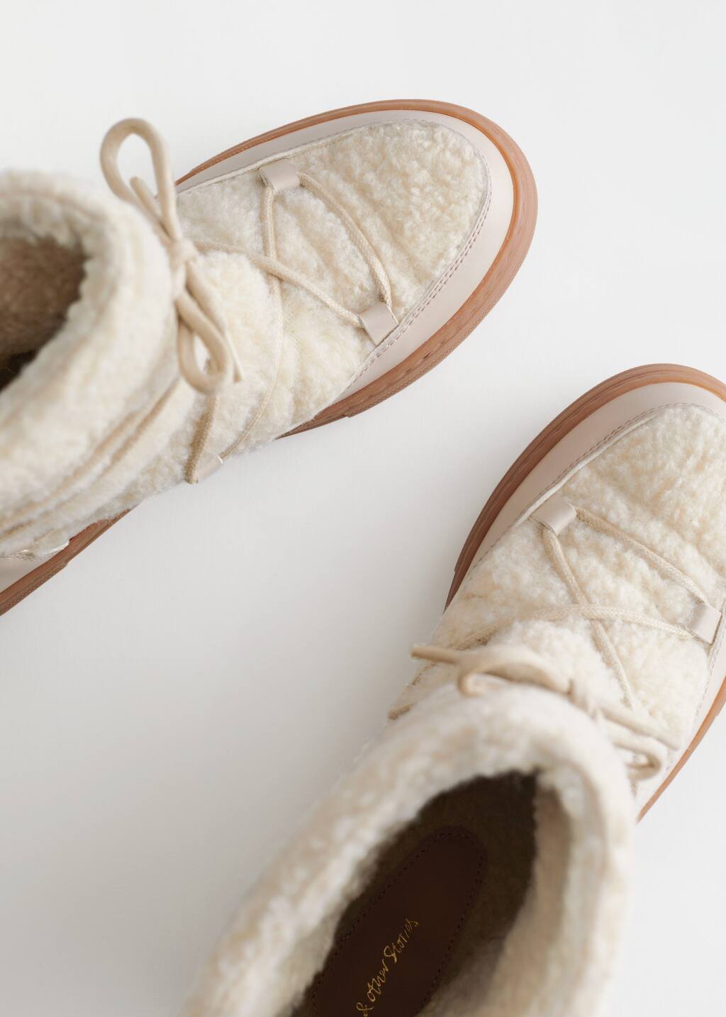 LaceUp Snow Boots - {{variantName}} - Descrizione dettagliata