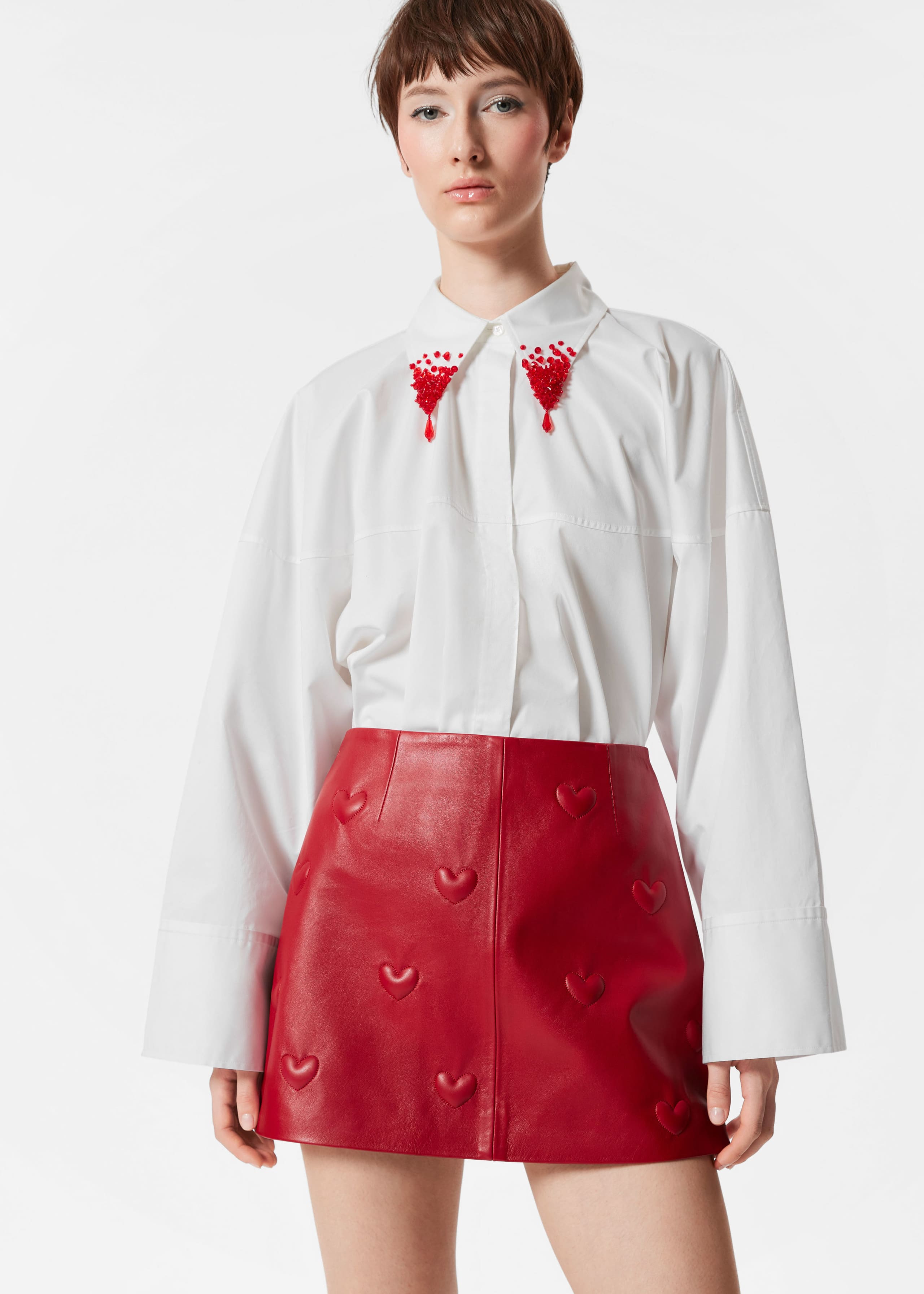 Image of Heart-Embossed Leather Mini Skirt
