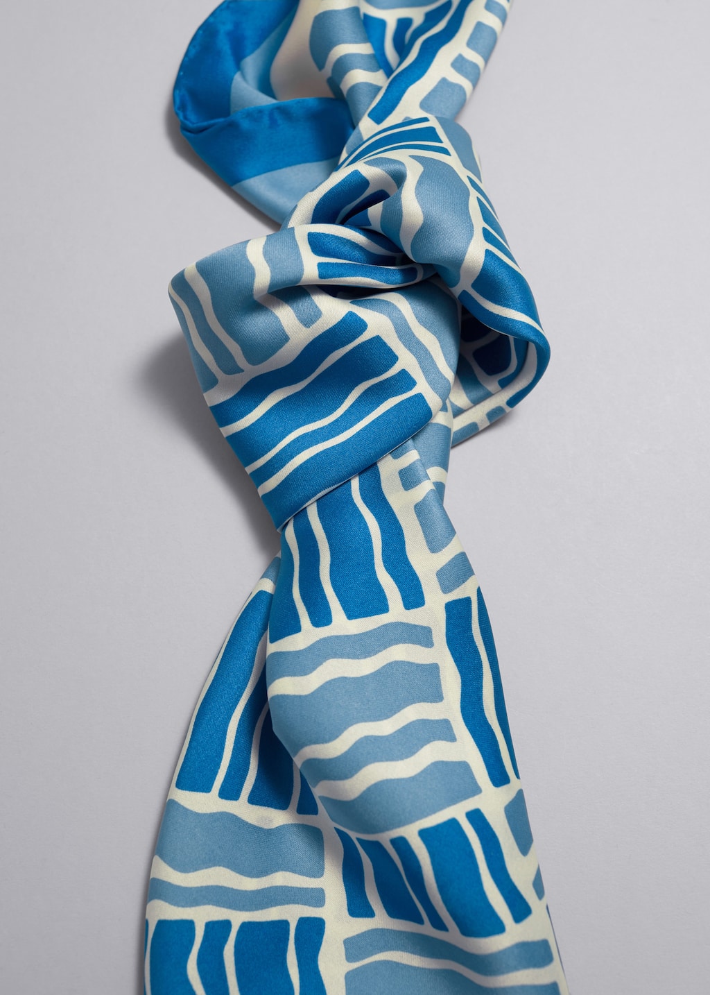 Foulard stampato - {{variantName}} - Descrizione dettagliata