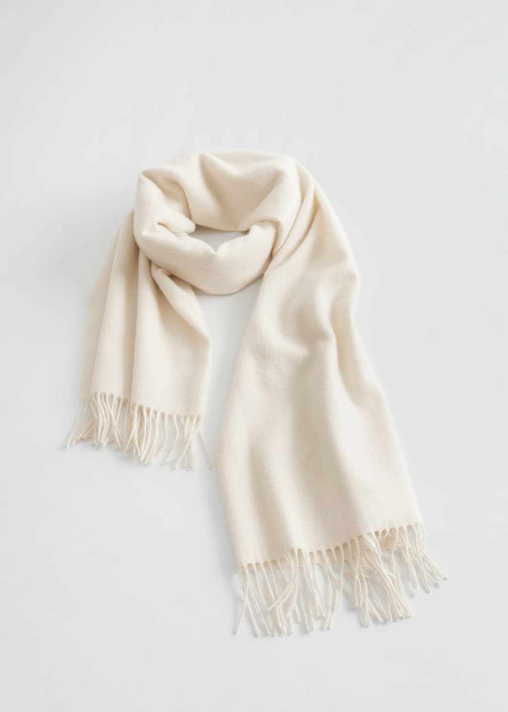 Image of Sciarpa in stile coperta in lana con frange