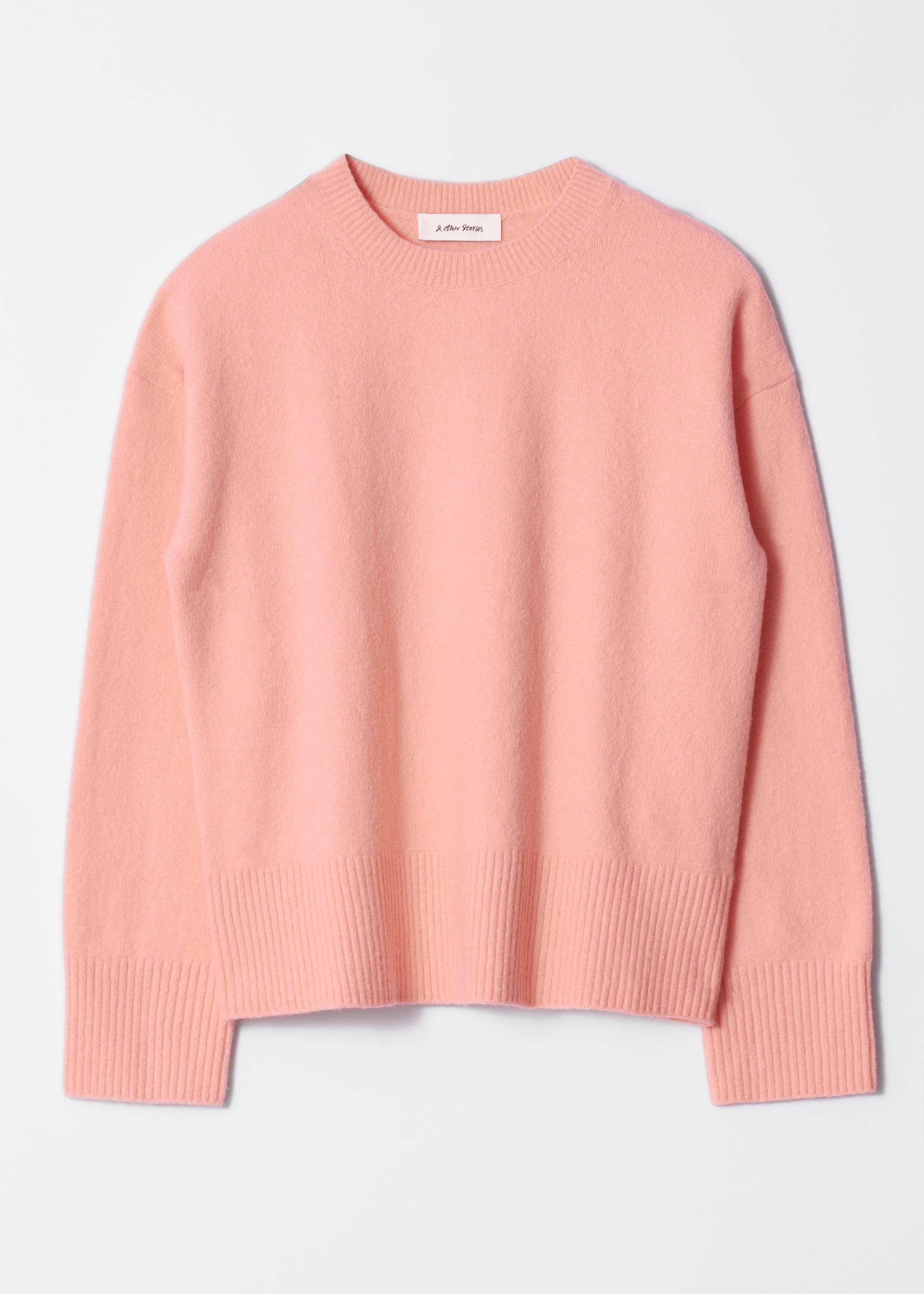 Visa större bild: Stickad tröja med avslappnad passform - Persika - DAM | H&M SE 1