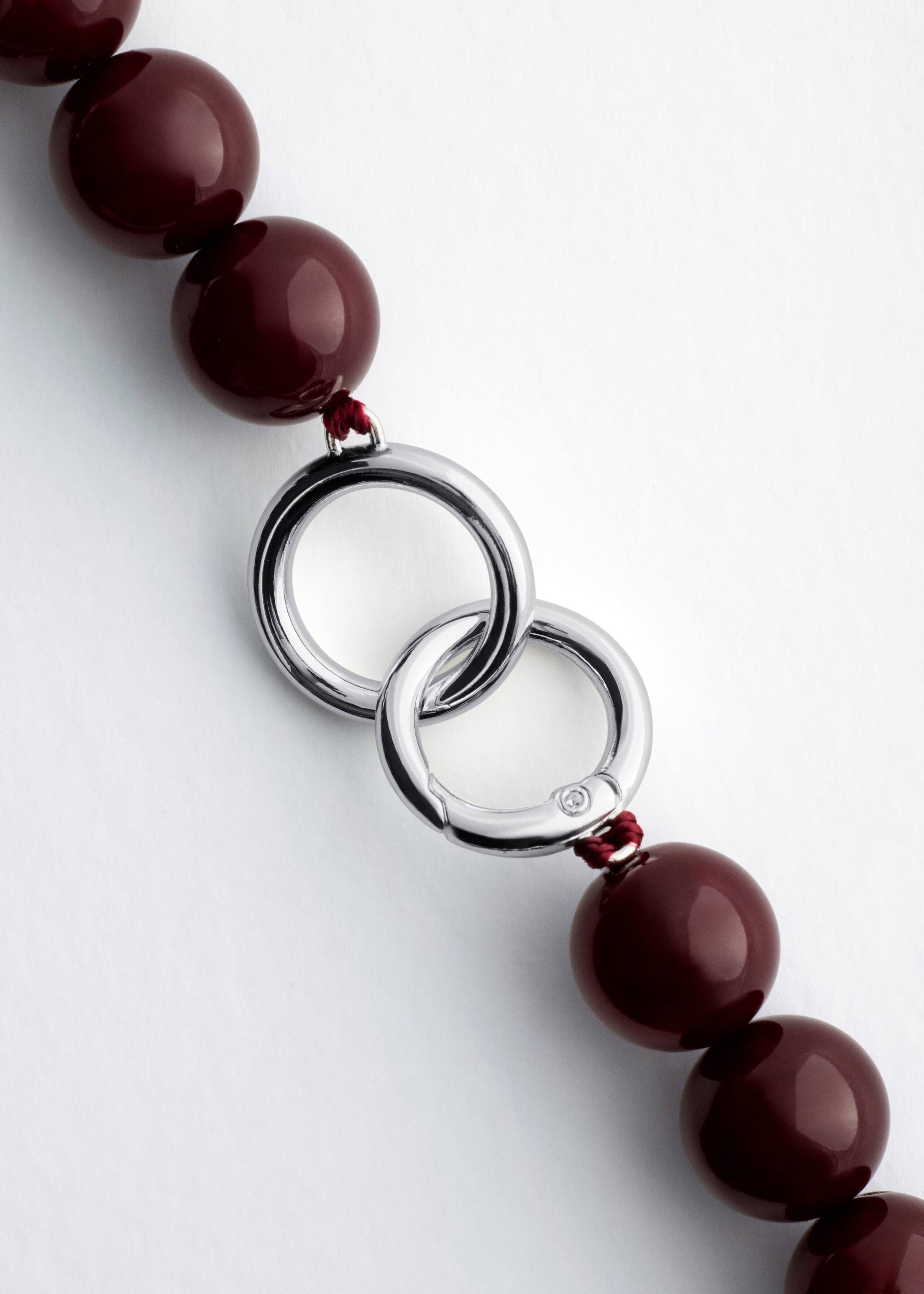 Collana corta con perle di pietra - {{variantName}} - Descrizione dettagliata