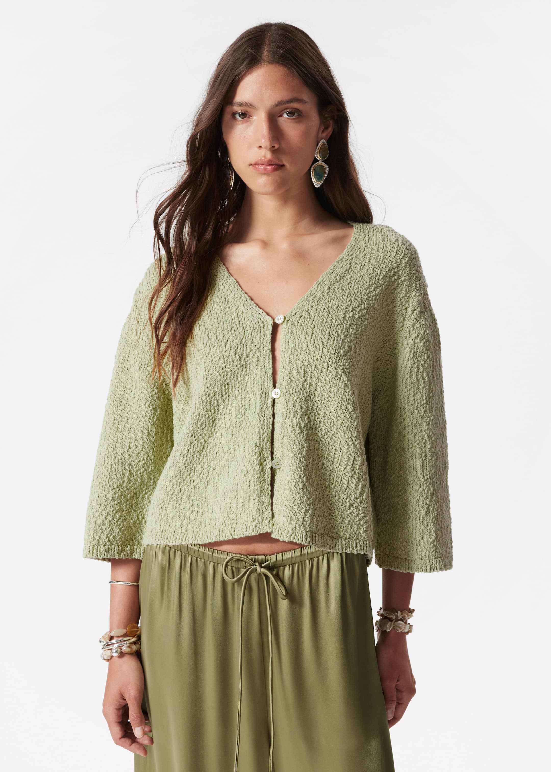 Visa större bild: Stickad cardigan med kort ärm - Pistagegrön - DAM | H&M SE 2