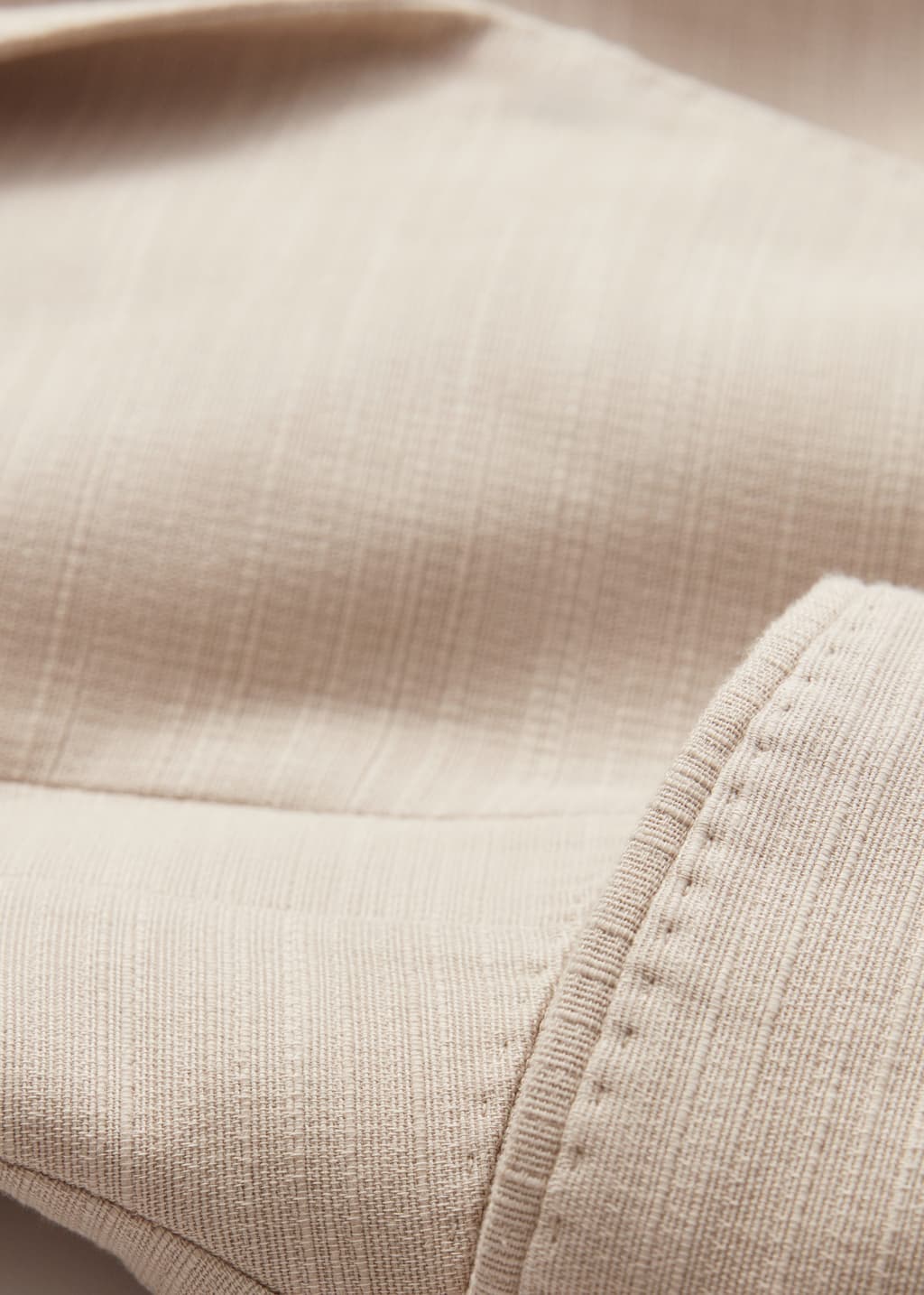 Americana con cintura péplum - {{variantName}} - Detalle descriptivo