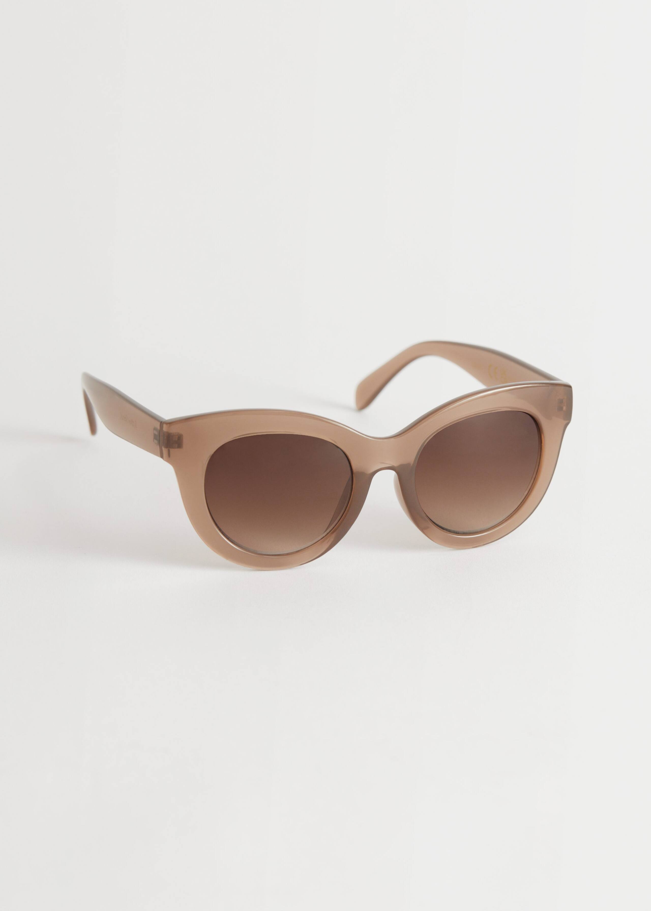 Oversized Rounded Sunglasses - Transparent Beige - Natura morta