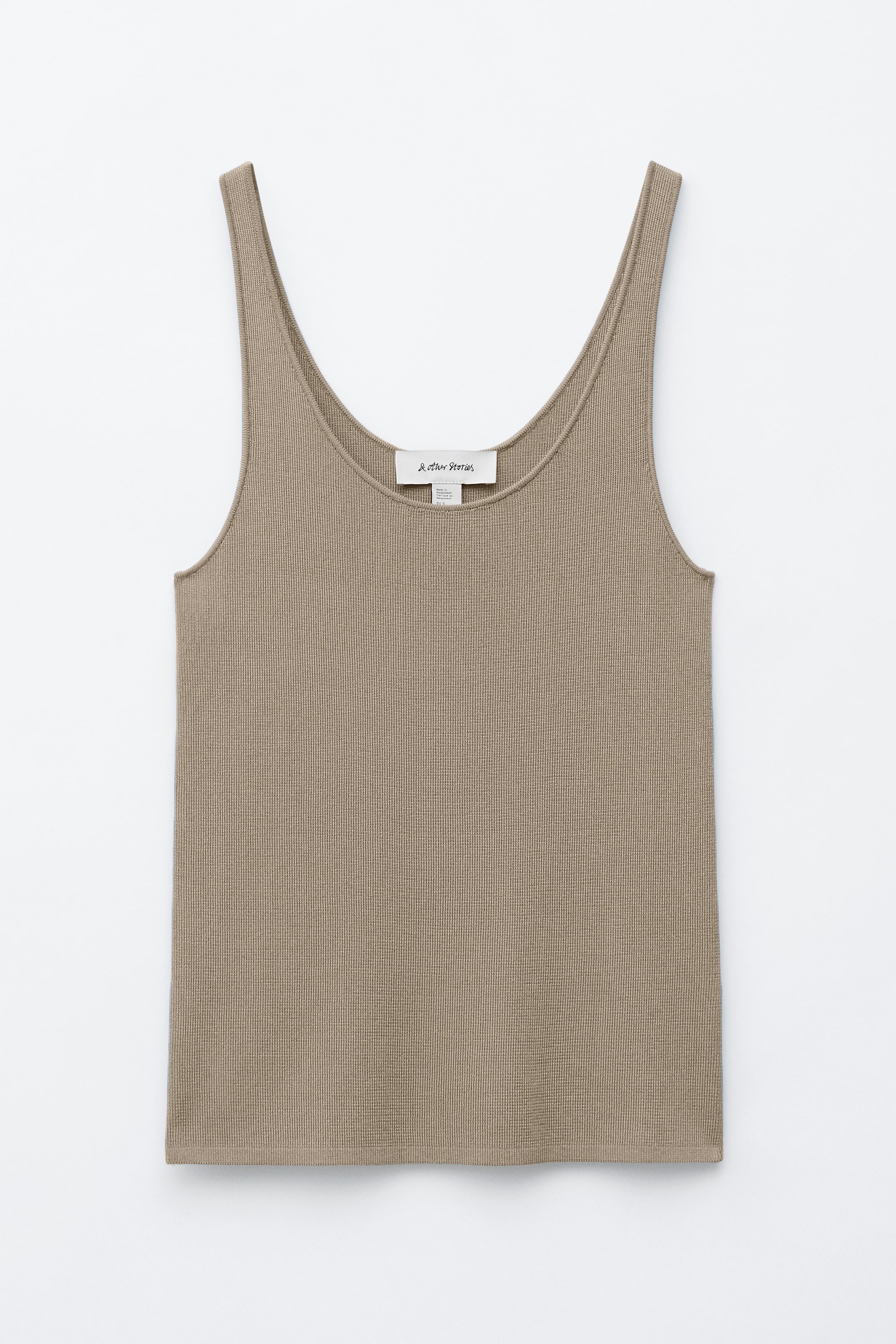 Visa större bild: Framsidan av ett taupe linne visar en normal passform med en finstickad textur, en djup rund halsringning och en rak skuren fåll.