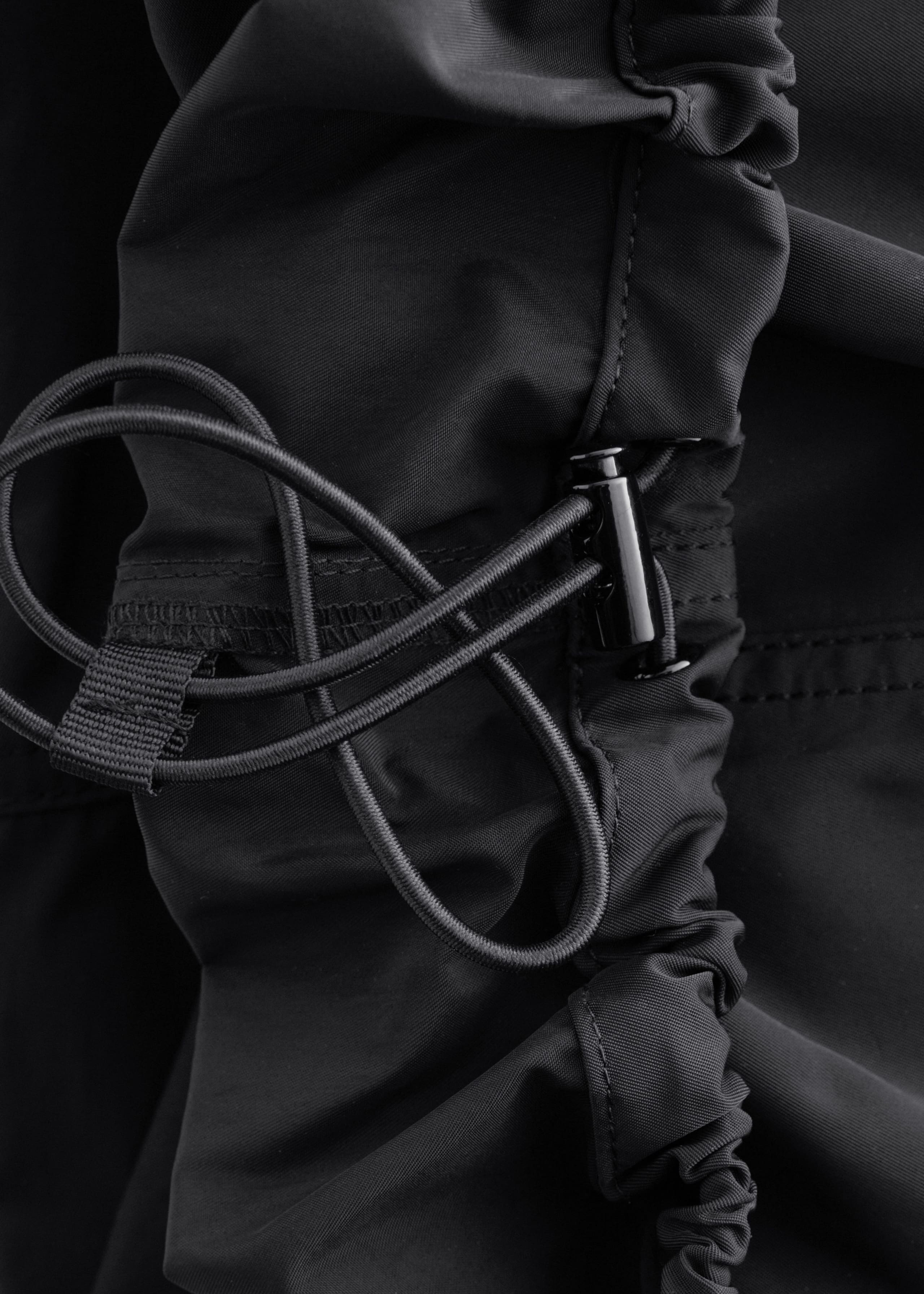 Image of Drawstring Barrel Leg Trousers