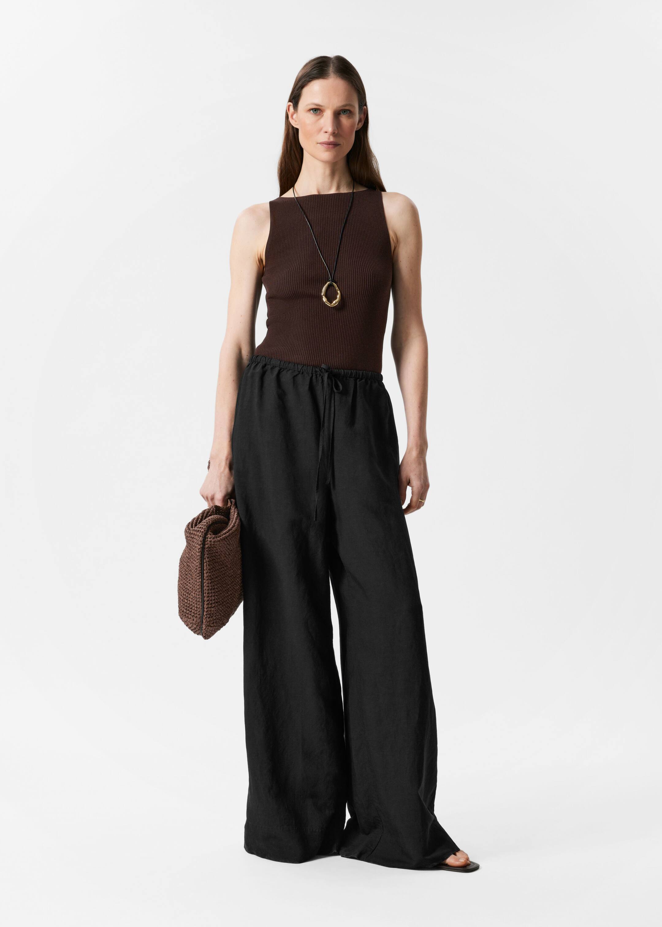 Visualizza immagine più grande: Pantaloni dalla vestibilità rilassata con coulisse - Nero - DONNA | H&M IT 1