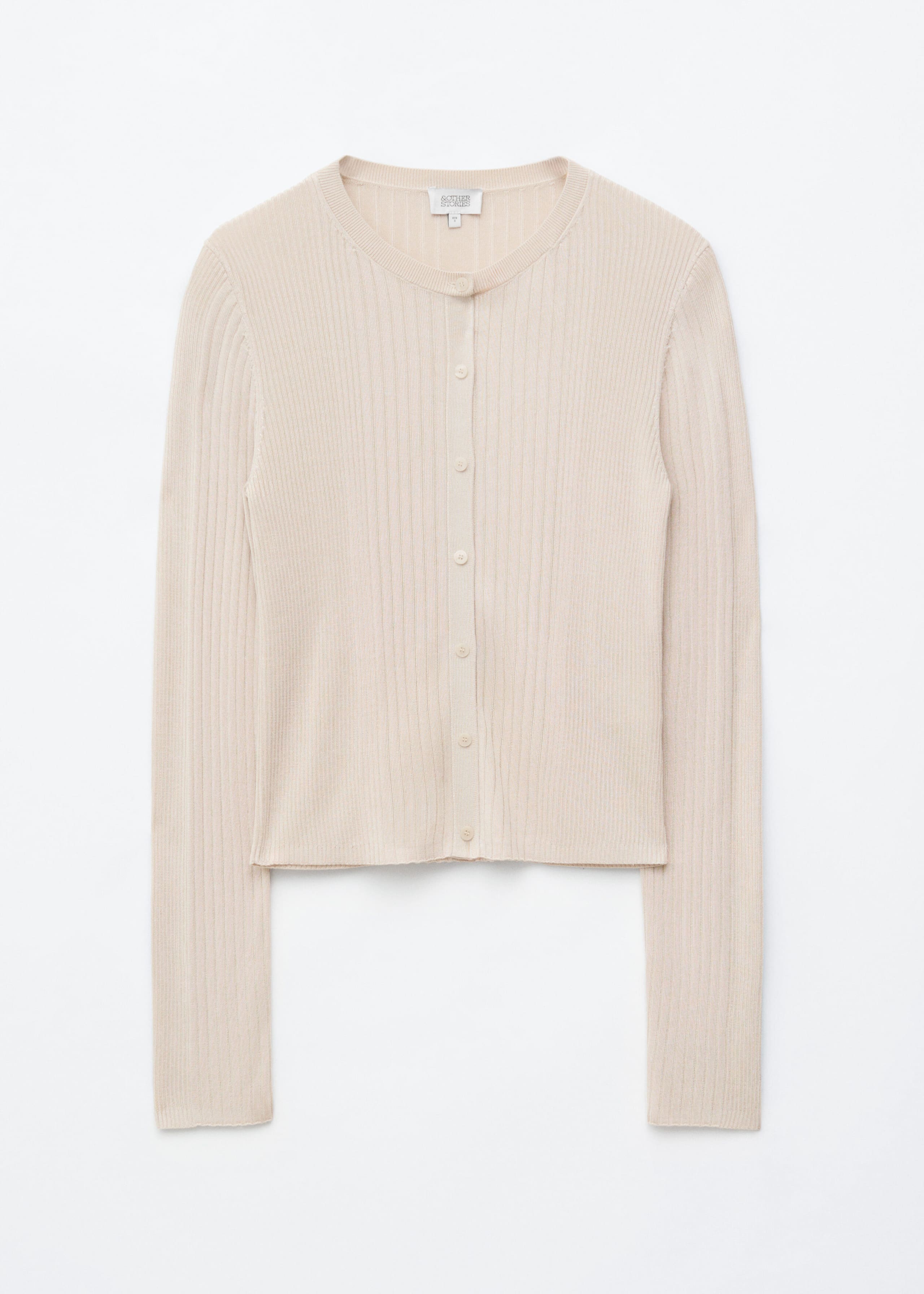 Ribbstickad cardigan – Ljusbeige – stilleben
