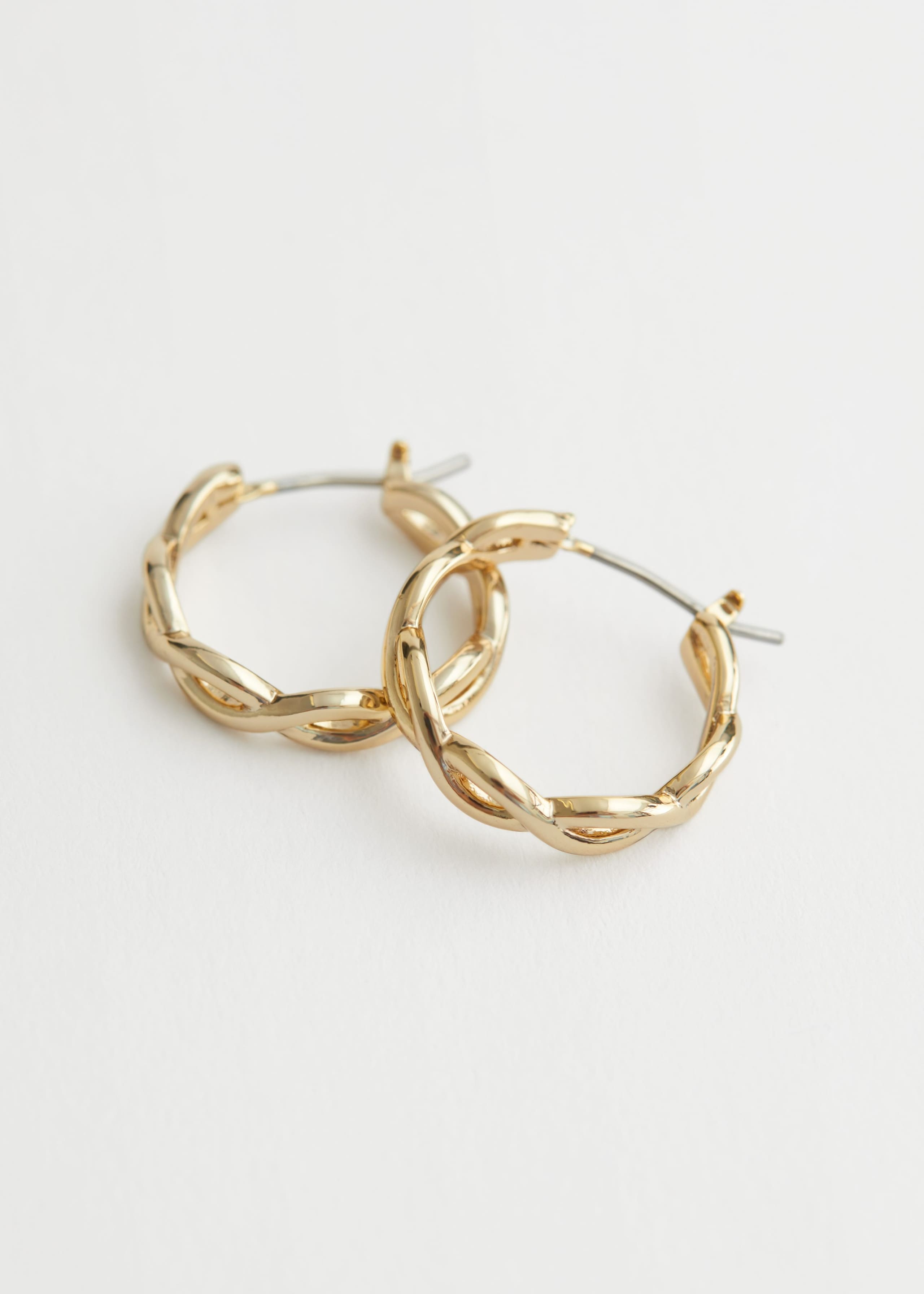 Chunky Twisted Hoop Earrings - Gold - Natura morta
