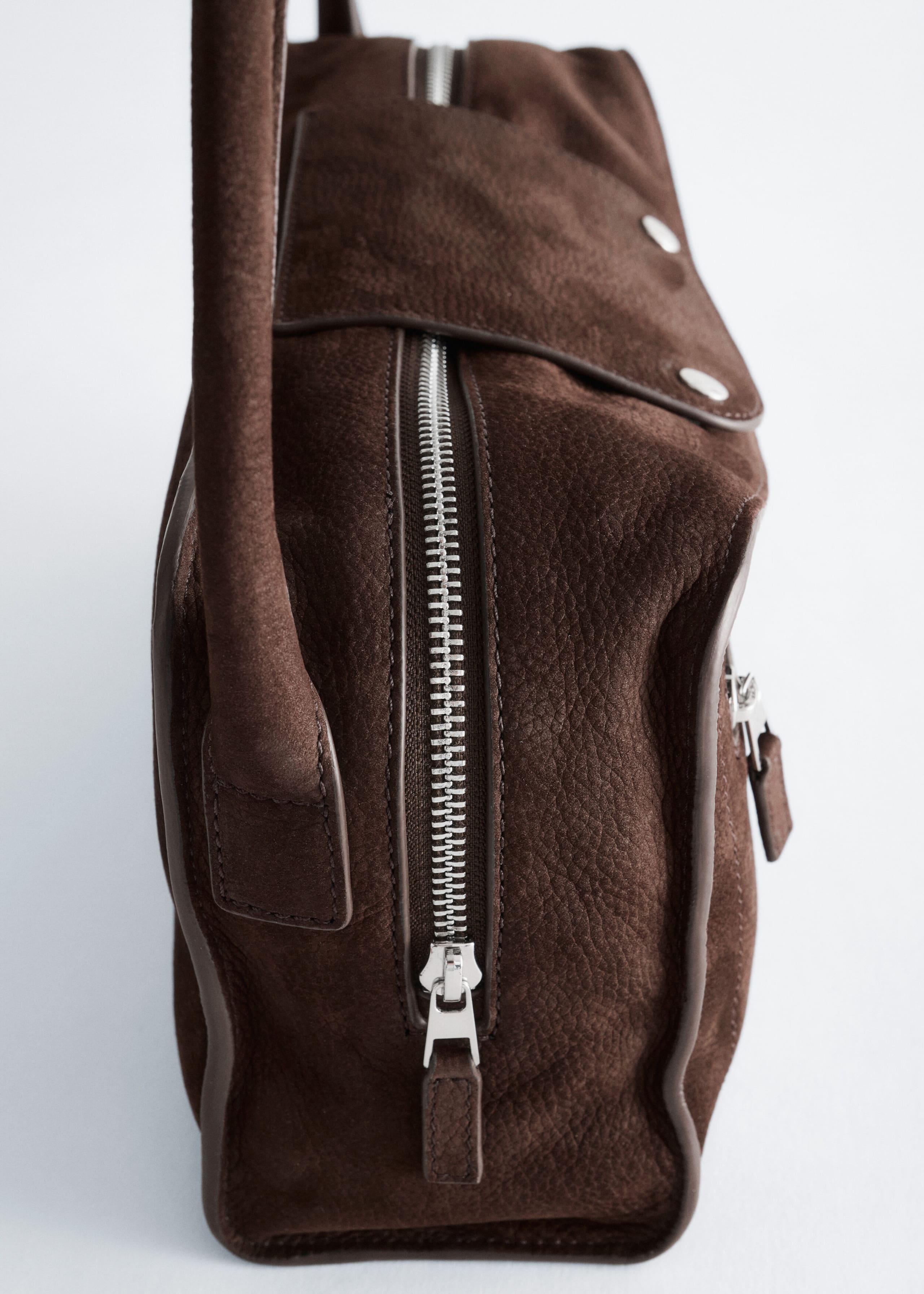 Curved Leather Bag - {{variantName}} - Descriptive Detail