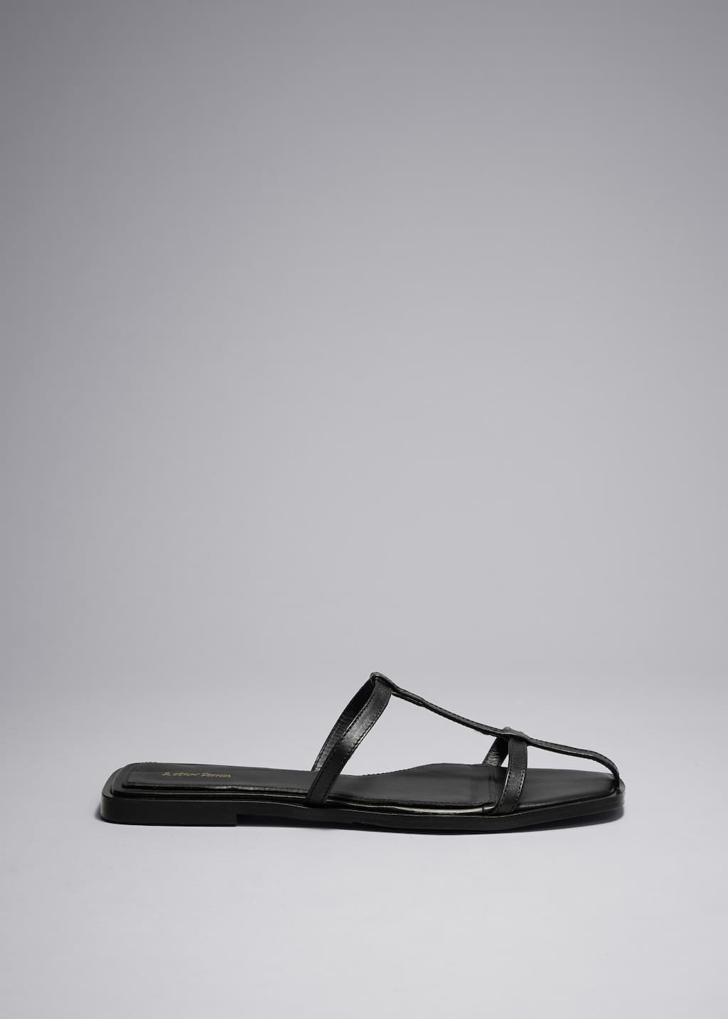 Sandalias con tiras de cuero