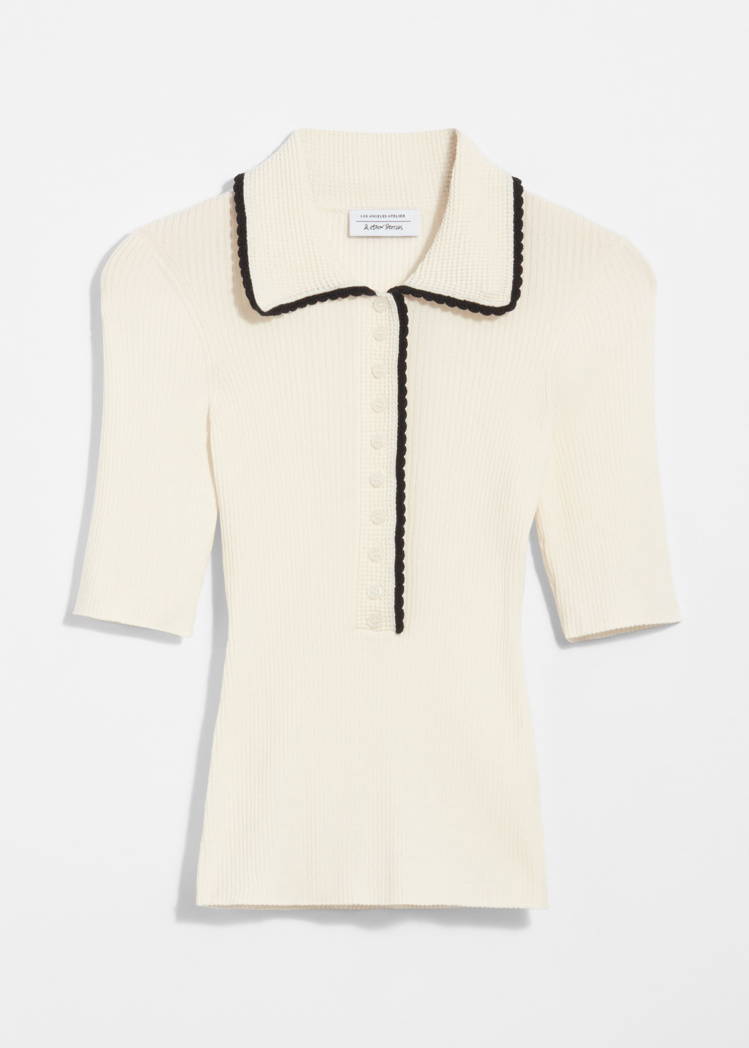 Rippstrickoberteil mit Wellenkante