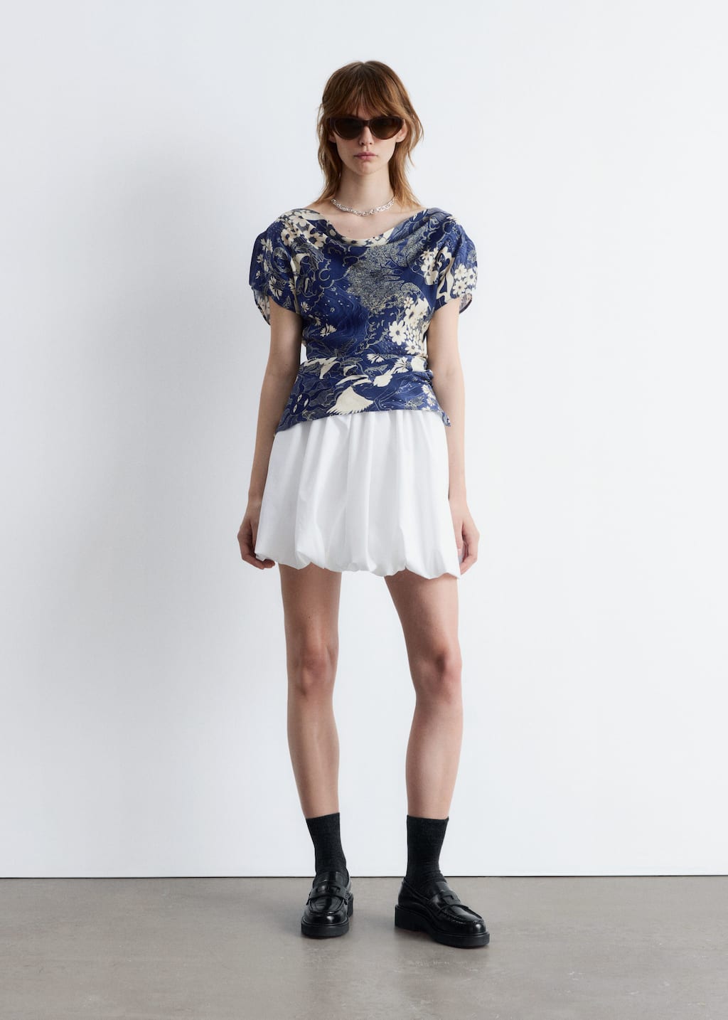 Image of Topp med draperad urringning