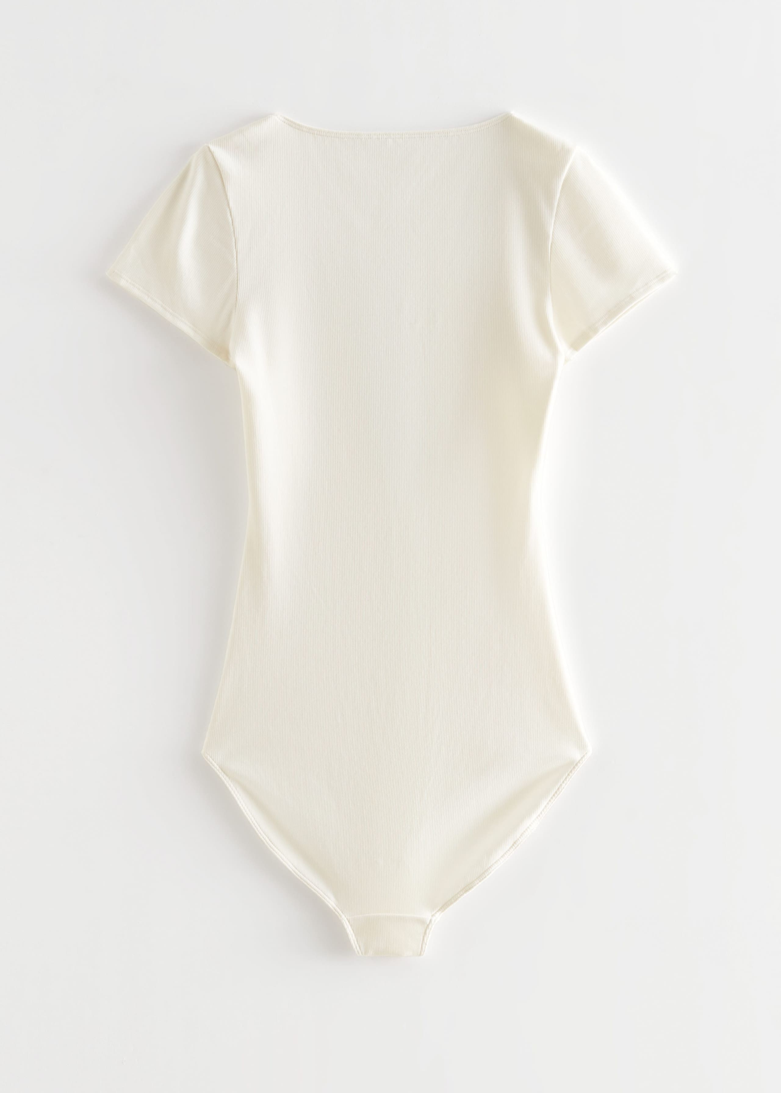 ButtonedShortSleeveBodysuit - White - Natura morta