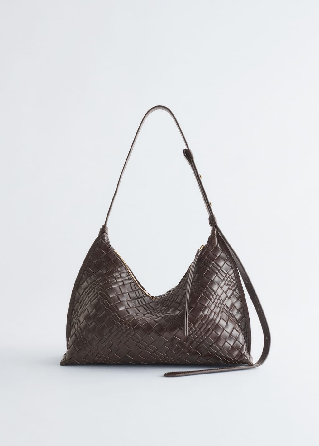 Image of Crossbodyväska i flätat läder