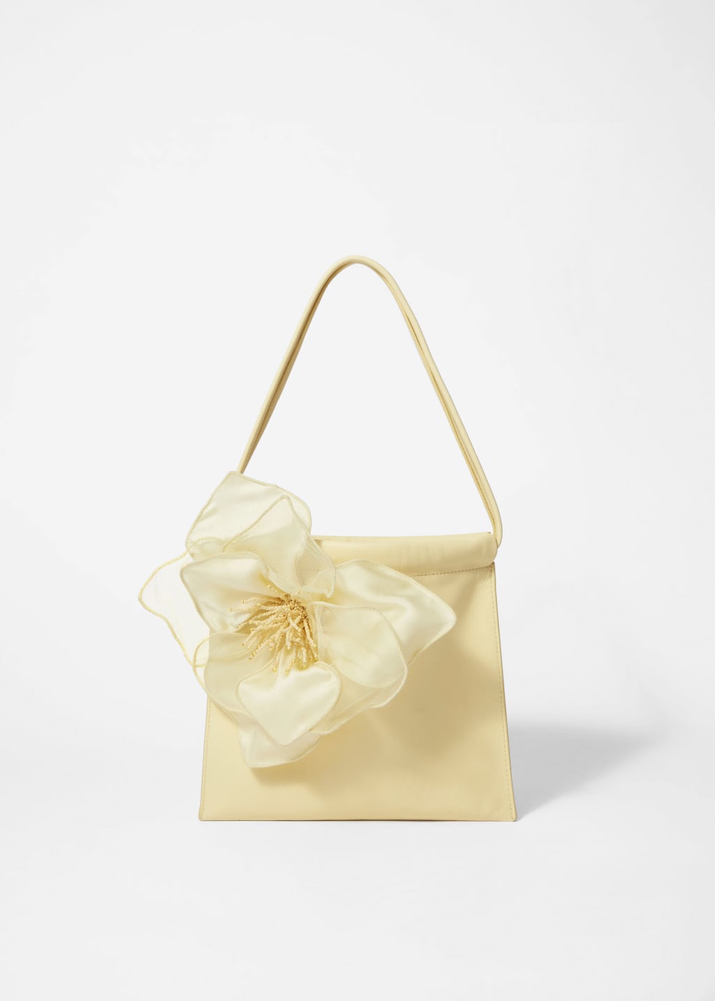 Beuteltasche aus Leder mit Blumenapplikation
