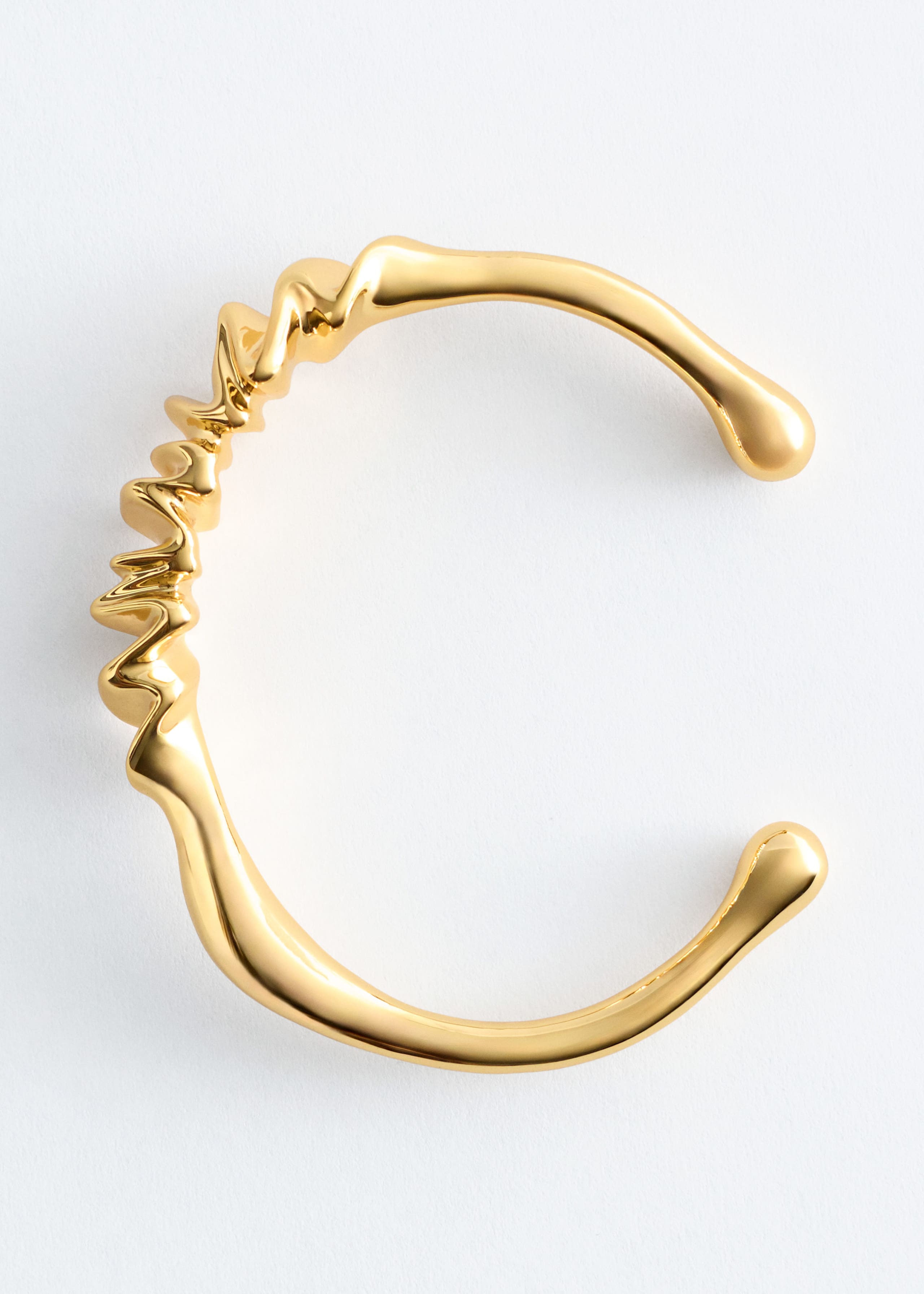 Bransoletka mankietowa z efektem marszczenia – Złoty – Martwa natura