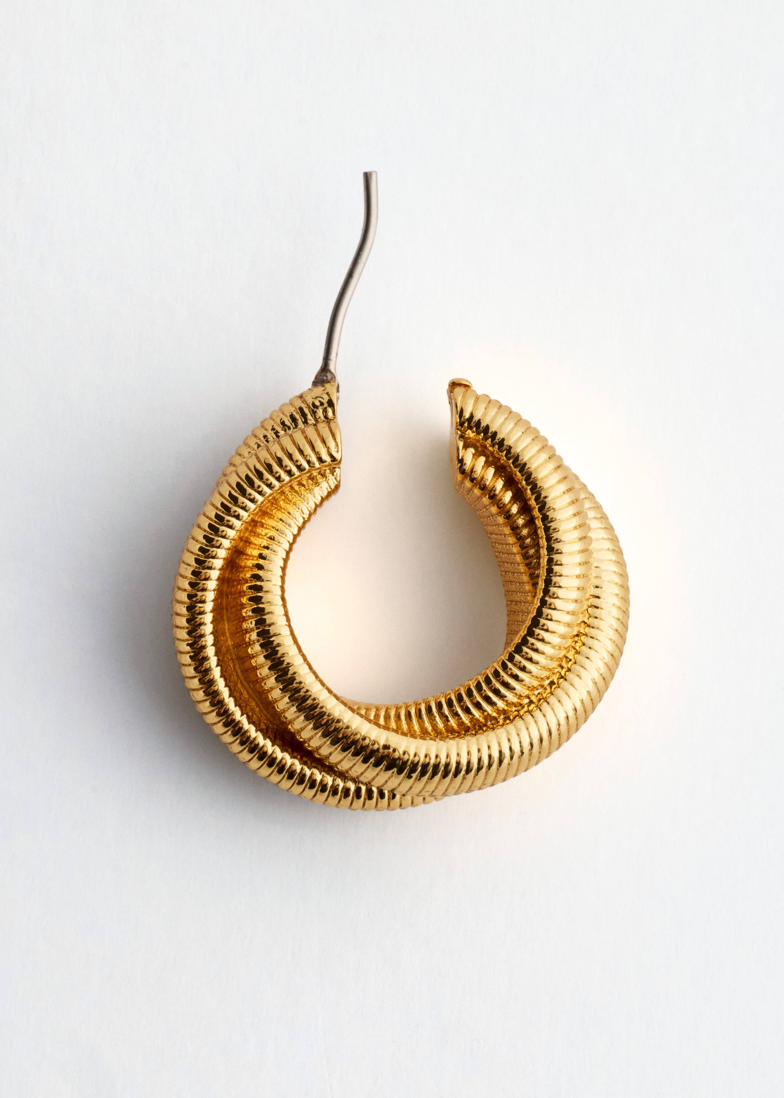 Plated Brass Twisted Hoops - {{variantName}} - Descriptive Detail