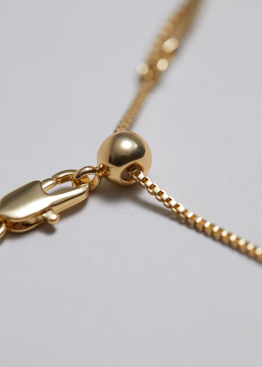 Collana a doppia catena - {{variantName}} - Descrizione dettagliata