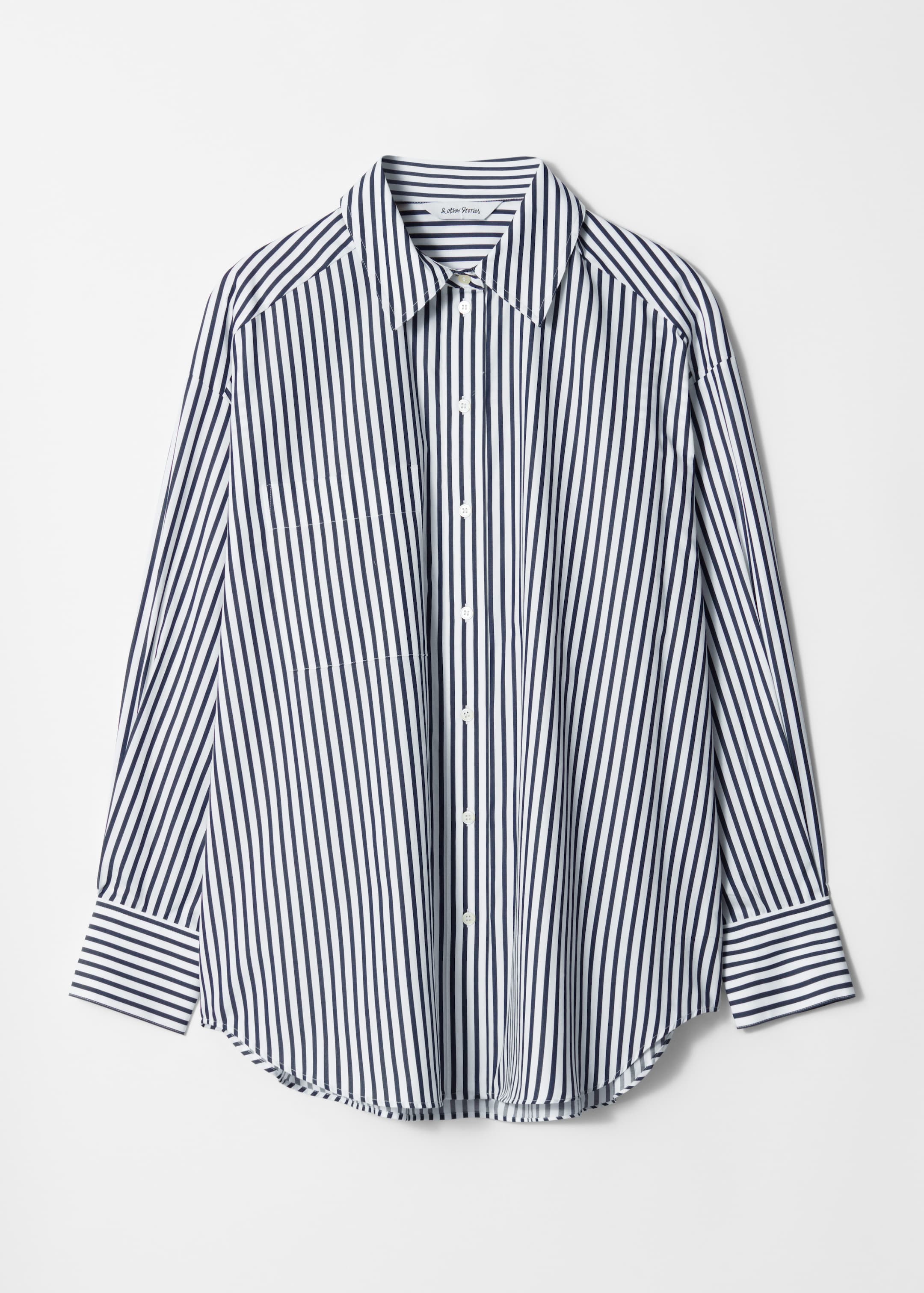 Visa större bild: Oversized skjorta - Marinblå ränder - DAM | H&M SE 1