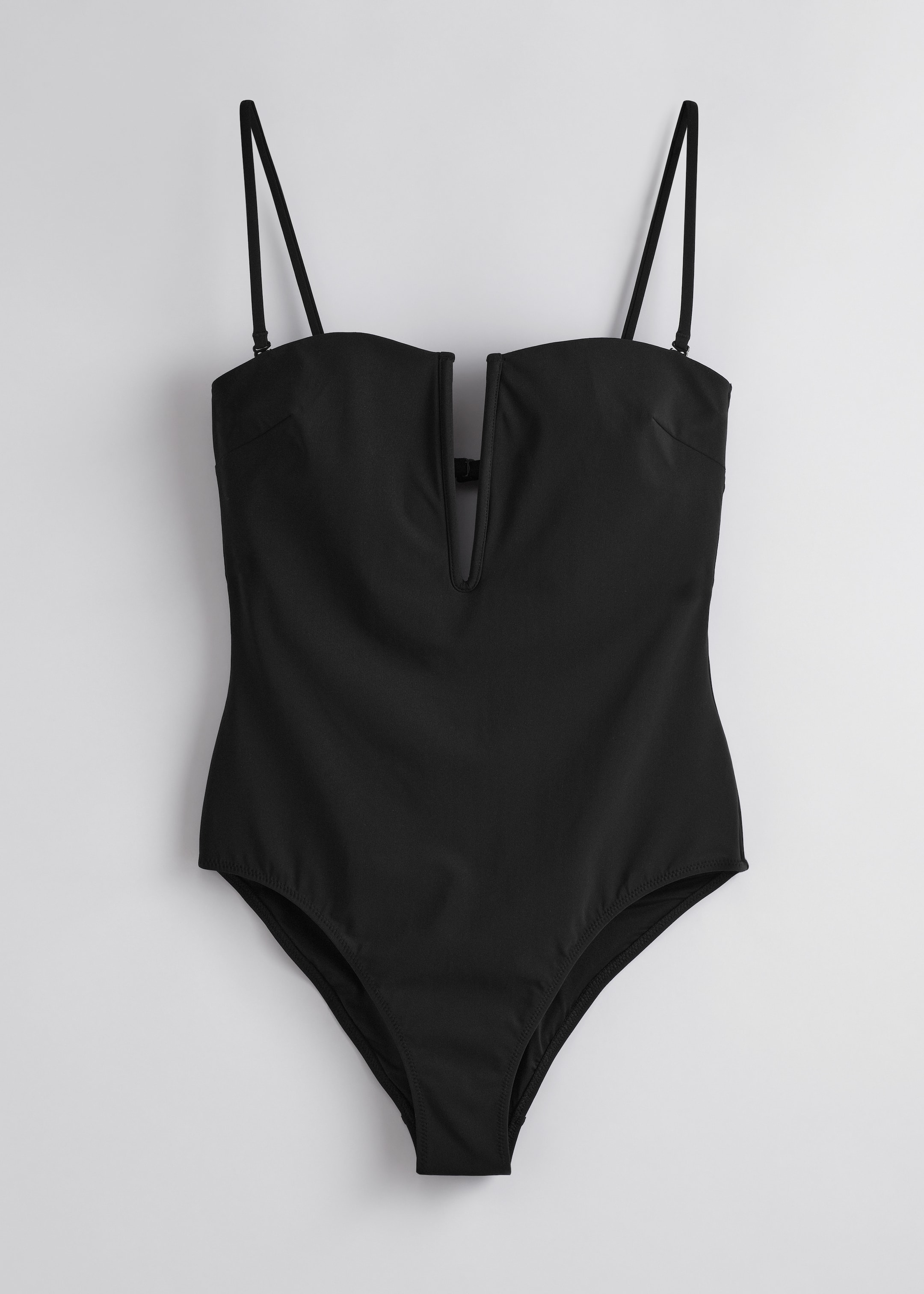 Visa större bild: V-ringad baddräkt - Svart - DAM | H&M SE 1
