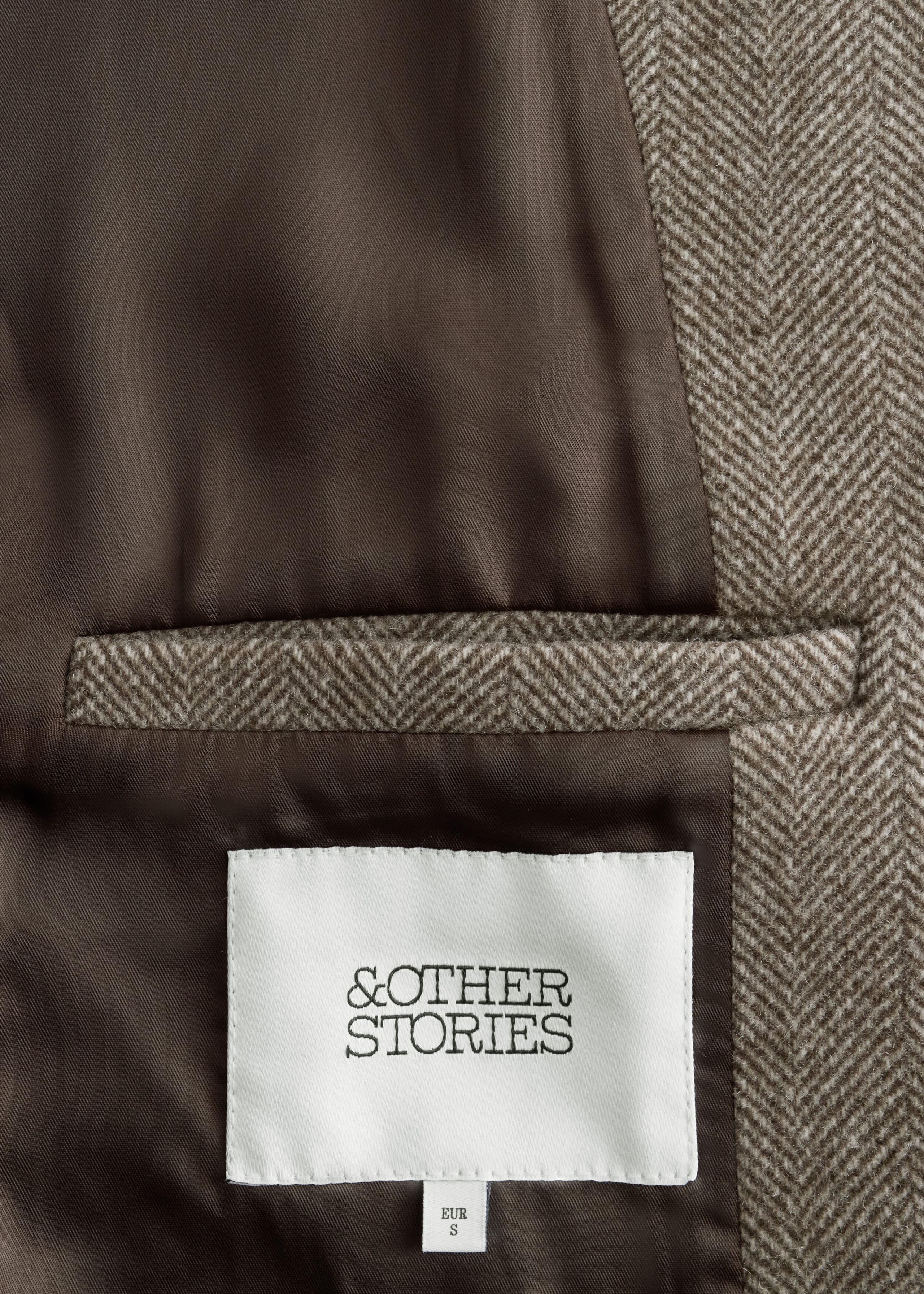Herringbone Coat - {{variantName}} - Descriptive Detail