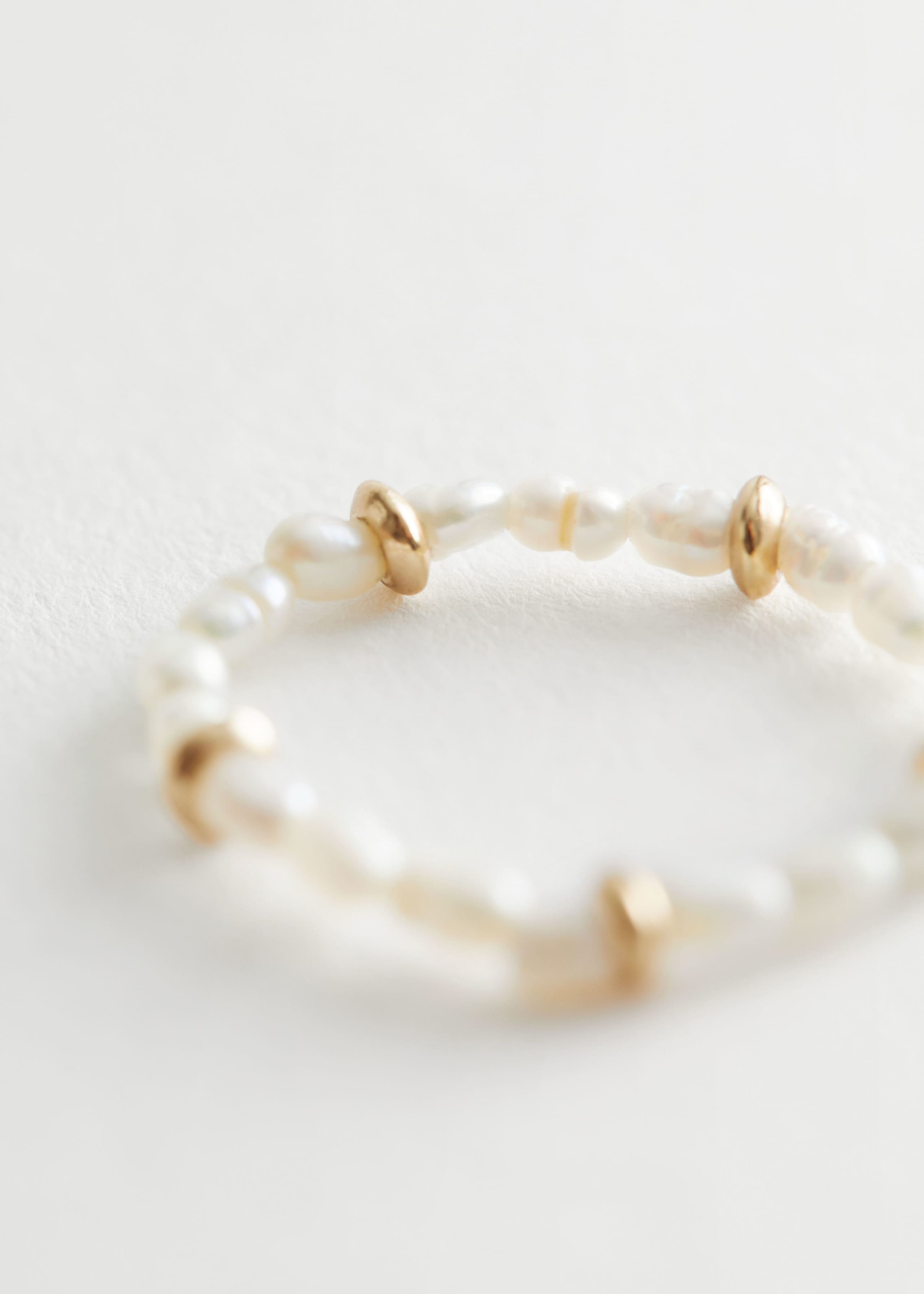 Anello con perle - {{variantName}} - Descrizione dettagliata