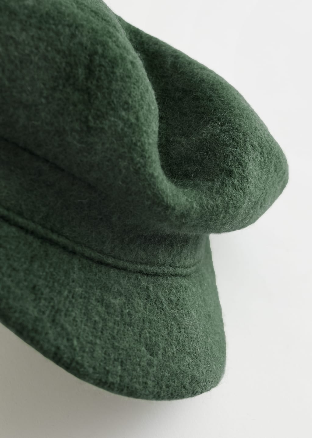 WoolBakerBoyCap - {{variantName}} - Detalle descriptivo