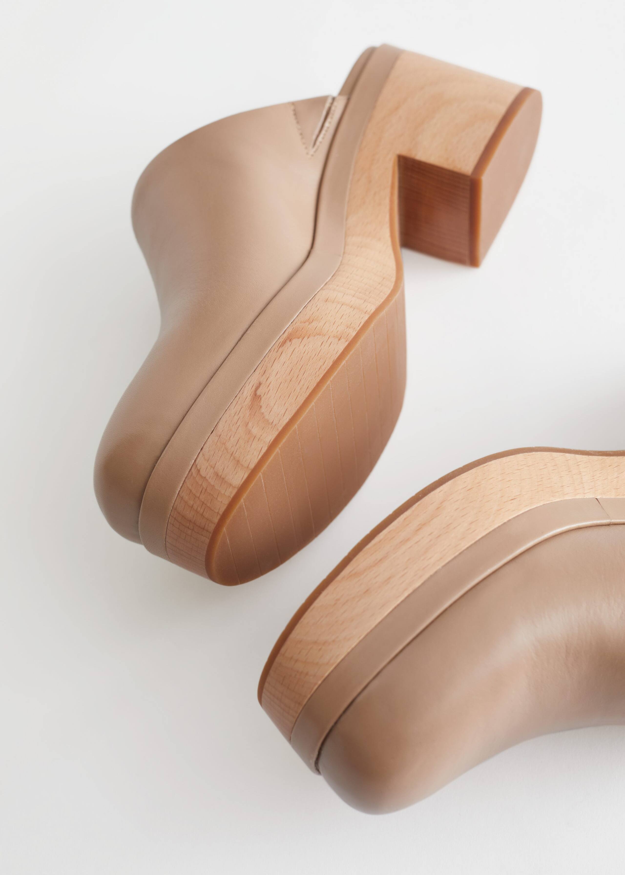 Wooden Heel Clogs - {{variantName}} - Descriptive Detail